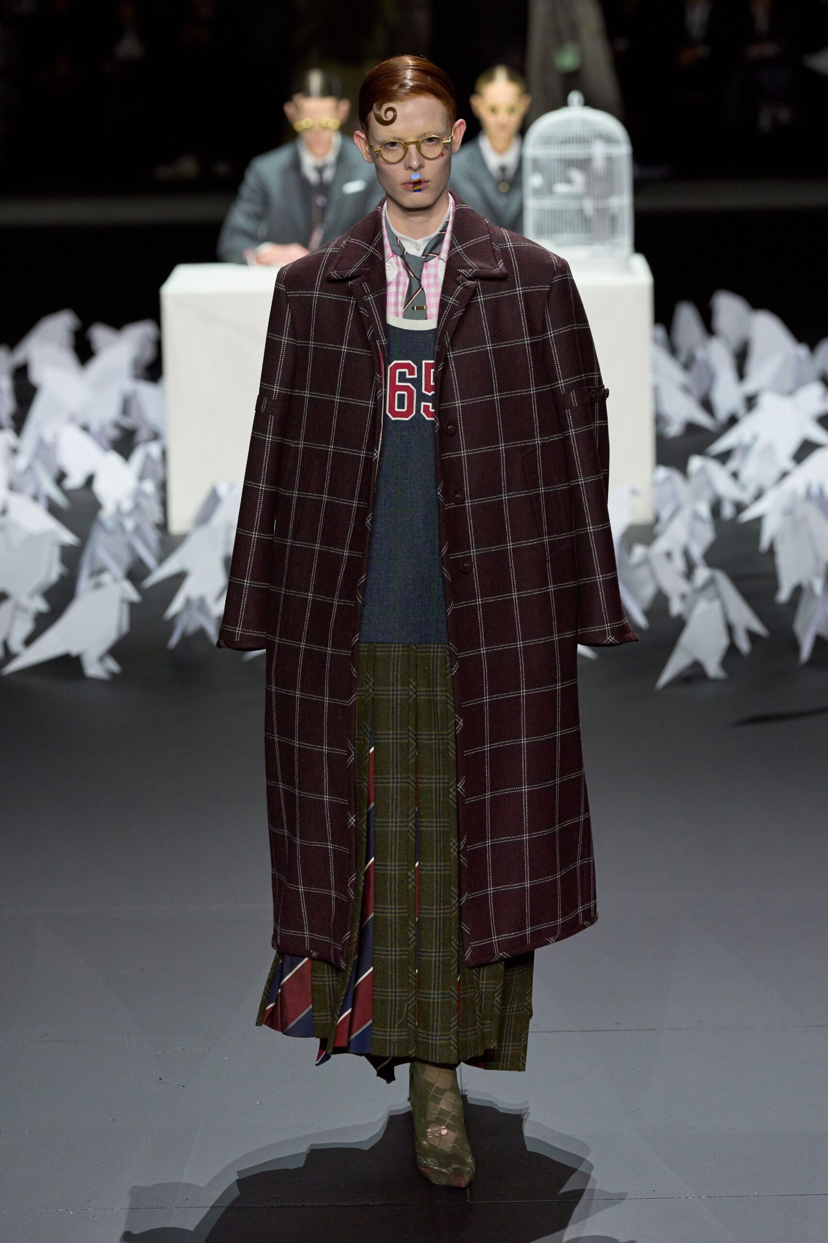 purple checked coat with blue sweater