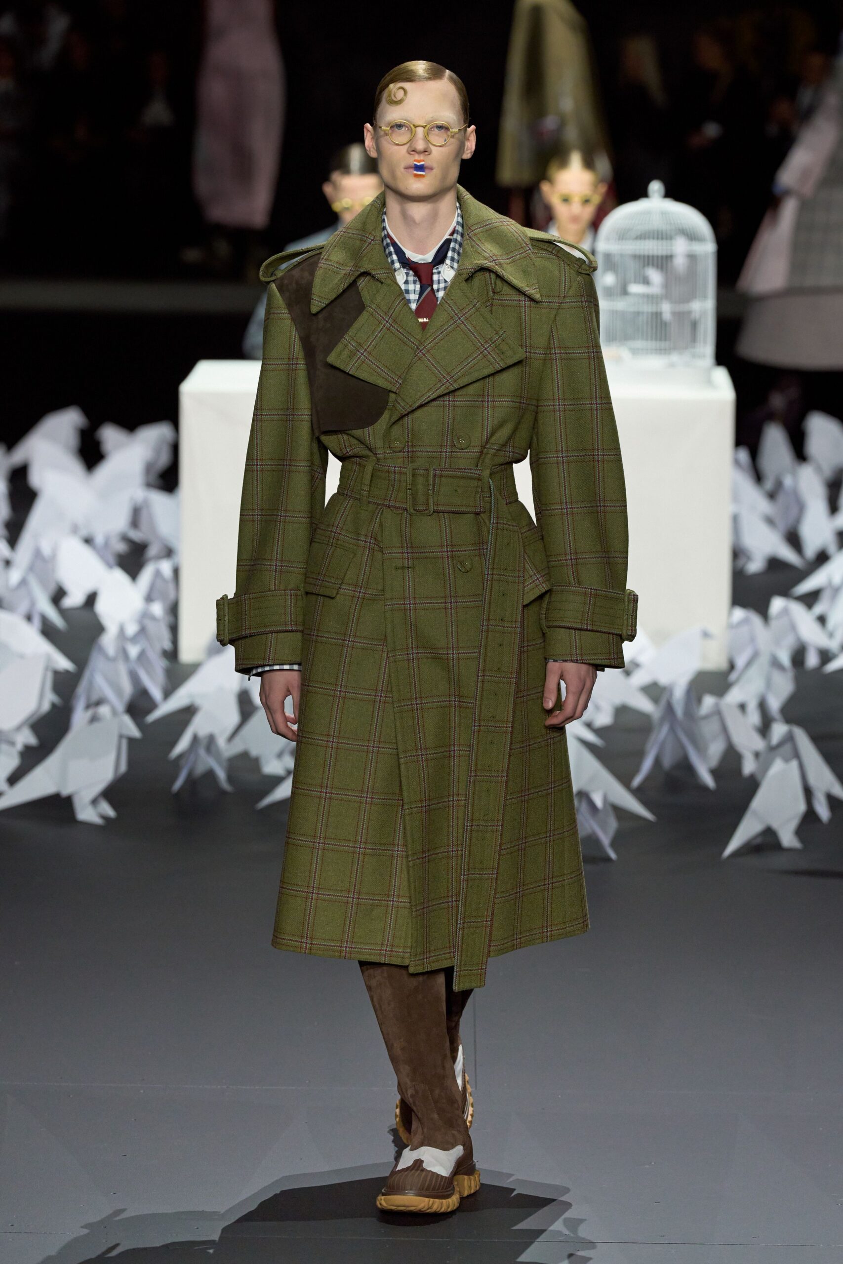 green checked coat with brown pants
