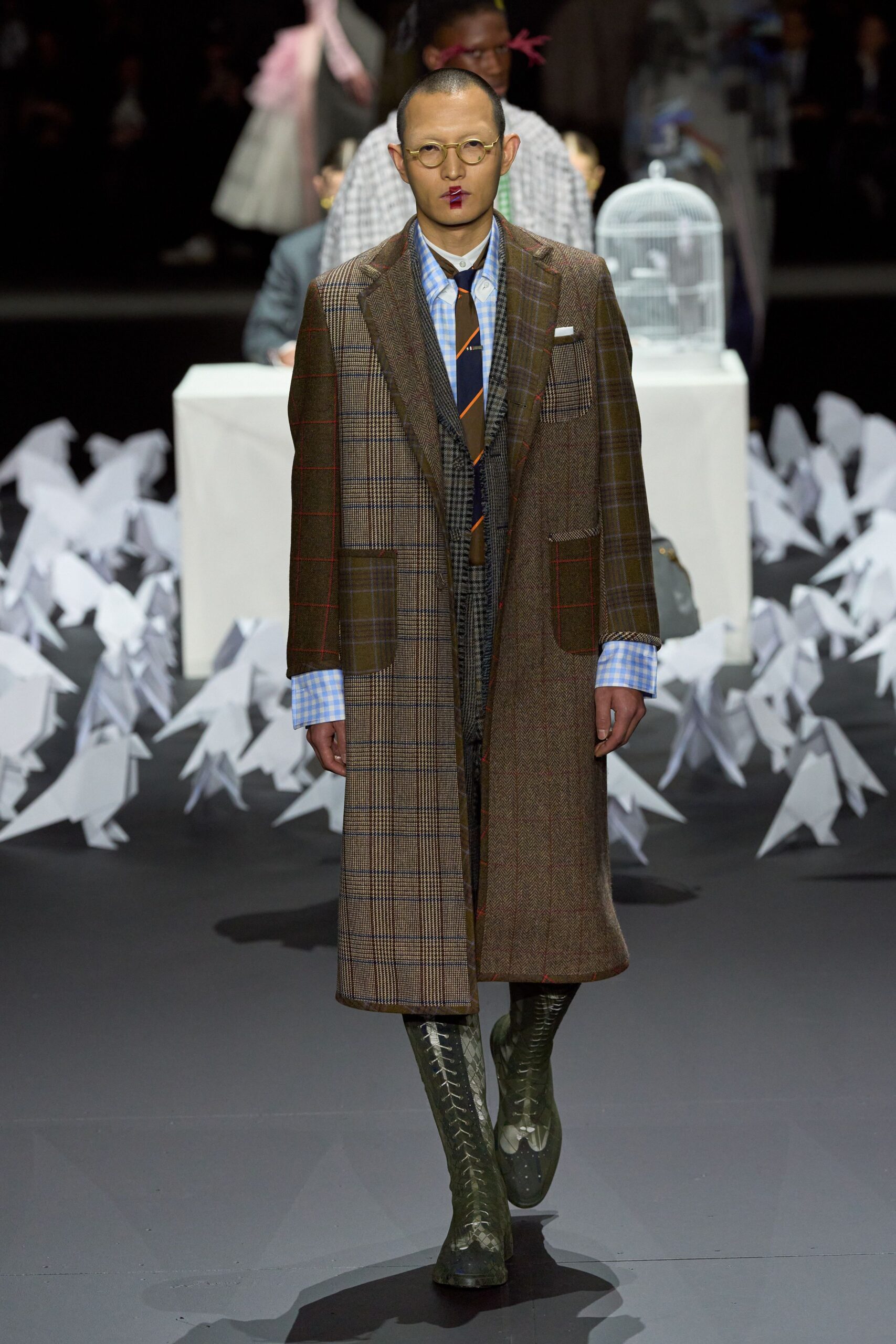 brown checked coat with green pants