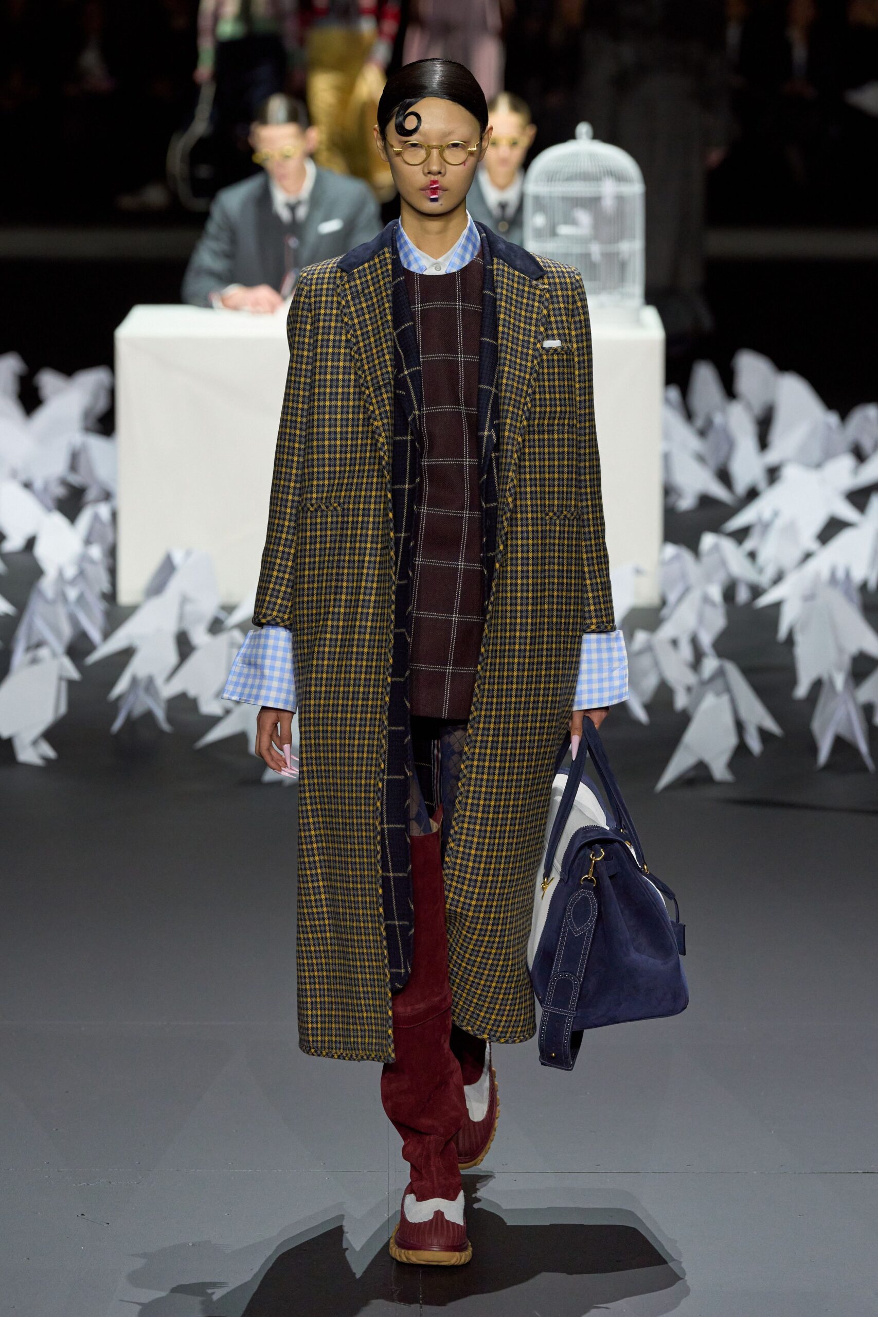 blue checked coat with red pants