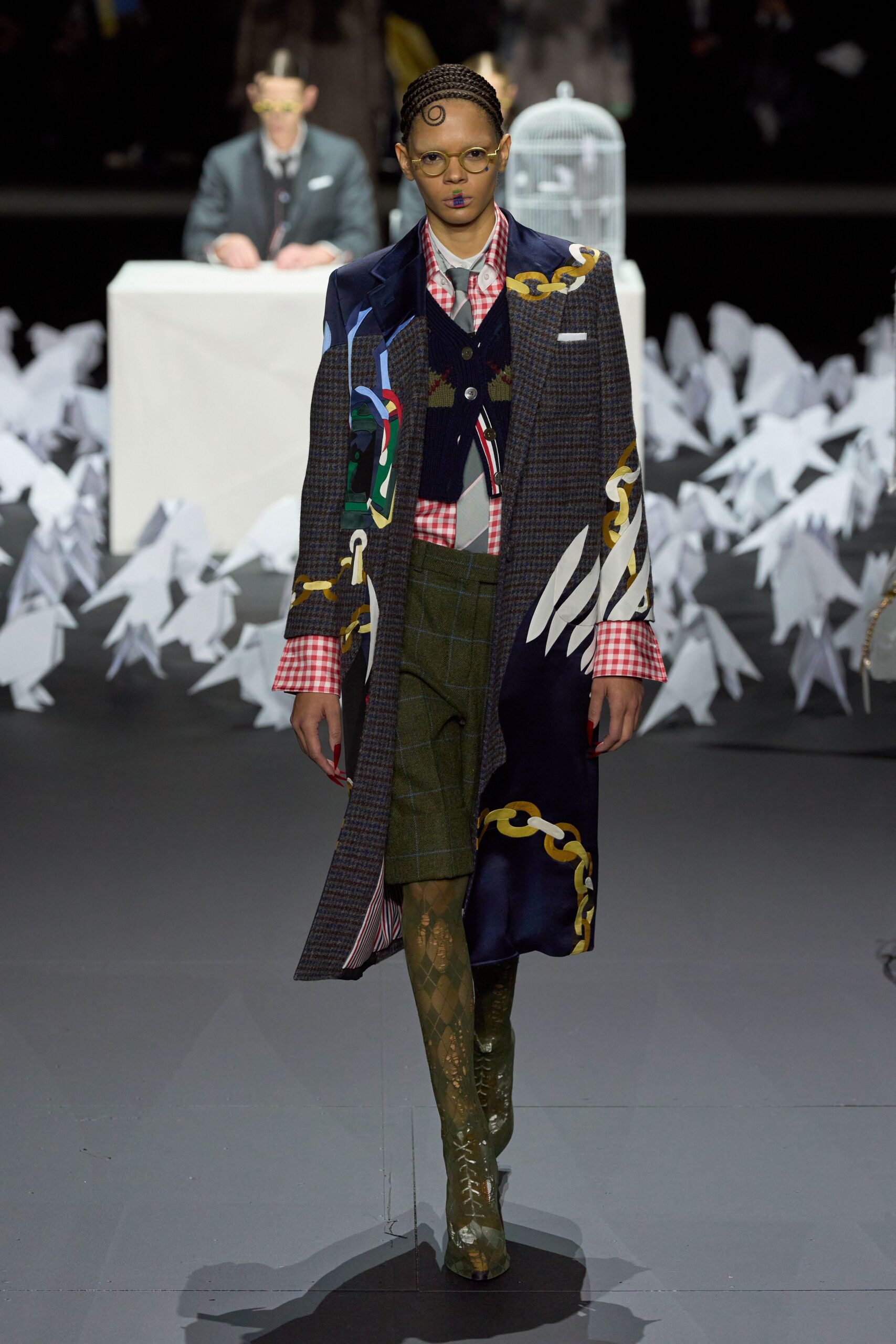 layered coat with checked shirt
