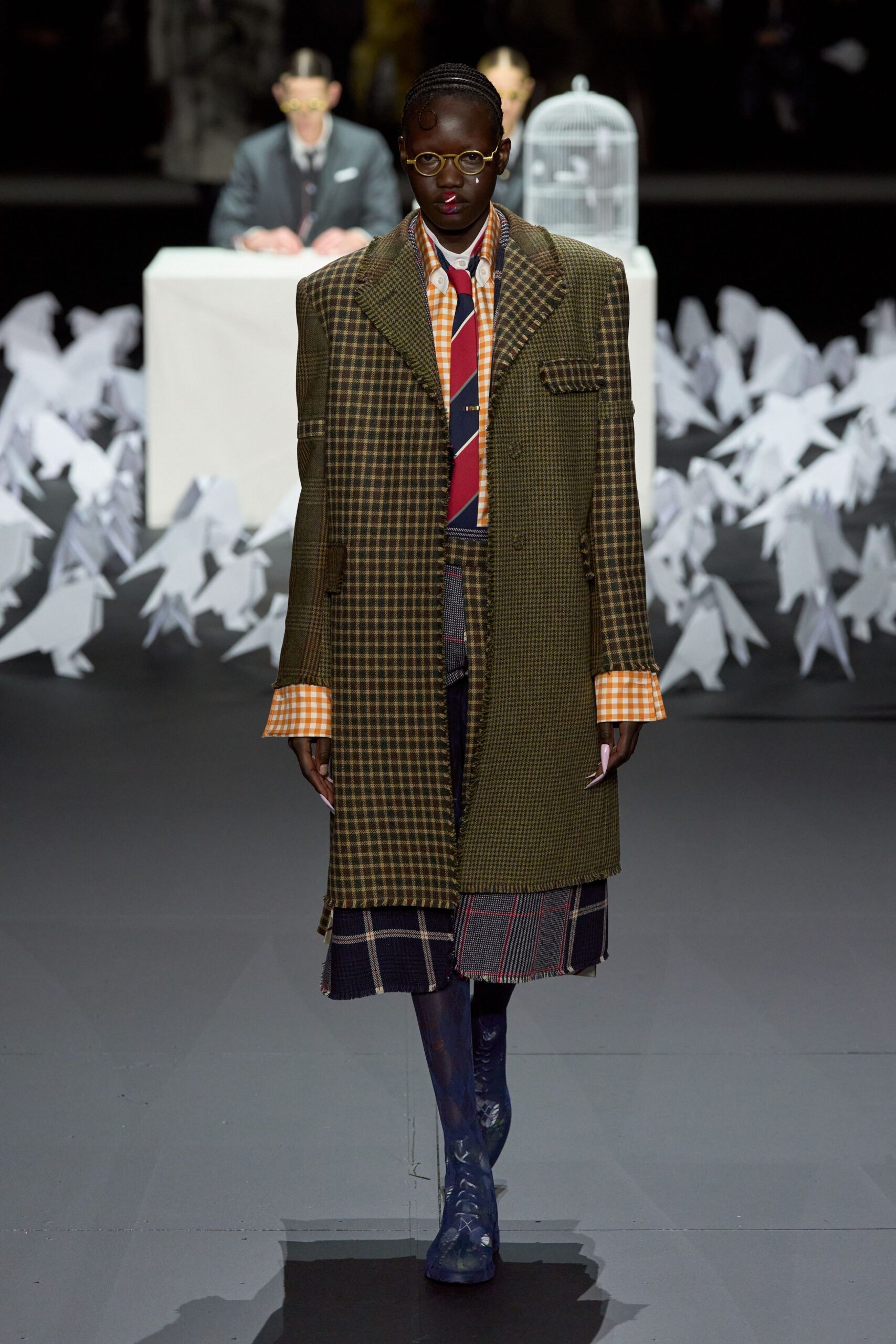 green plaid coat with blue shoes