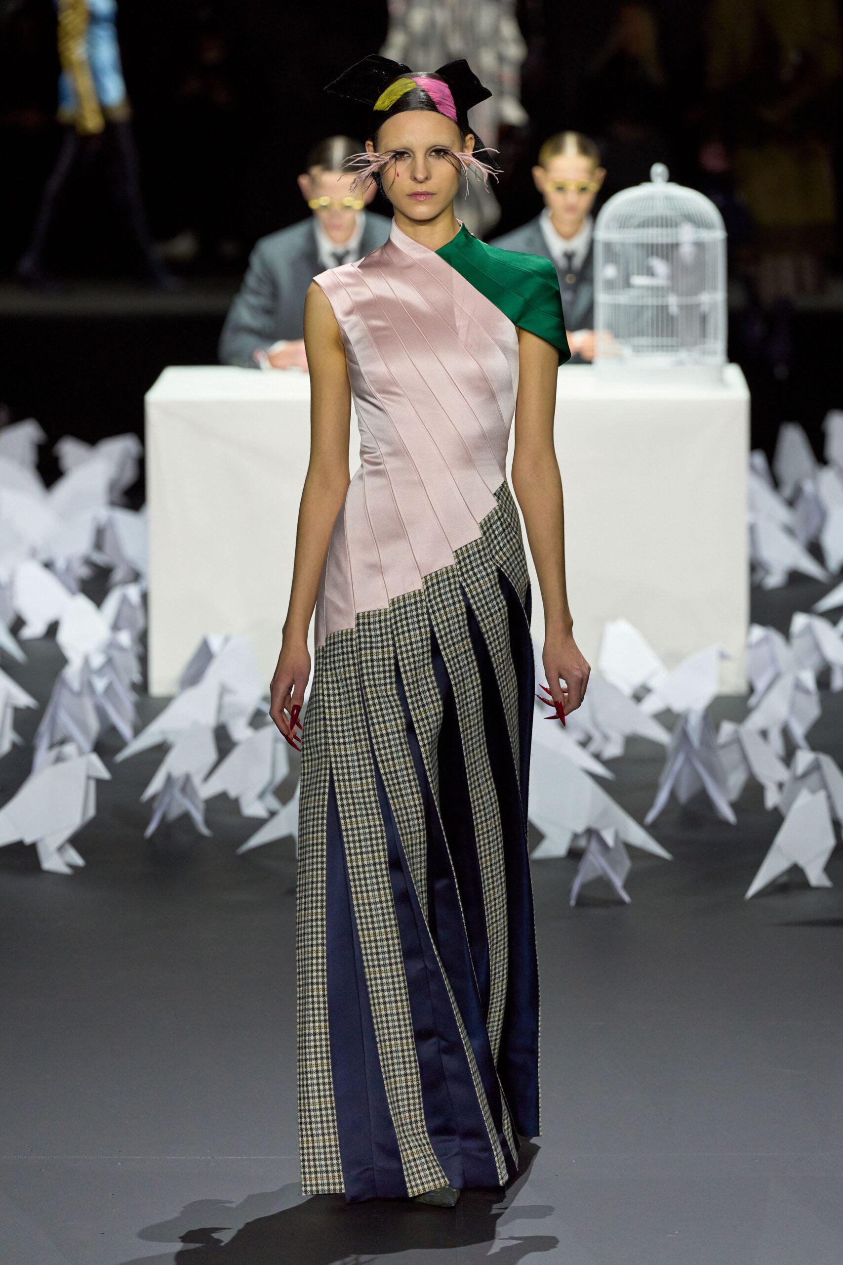 pleated pink and navy gown with hat