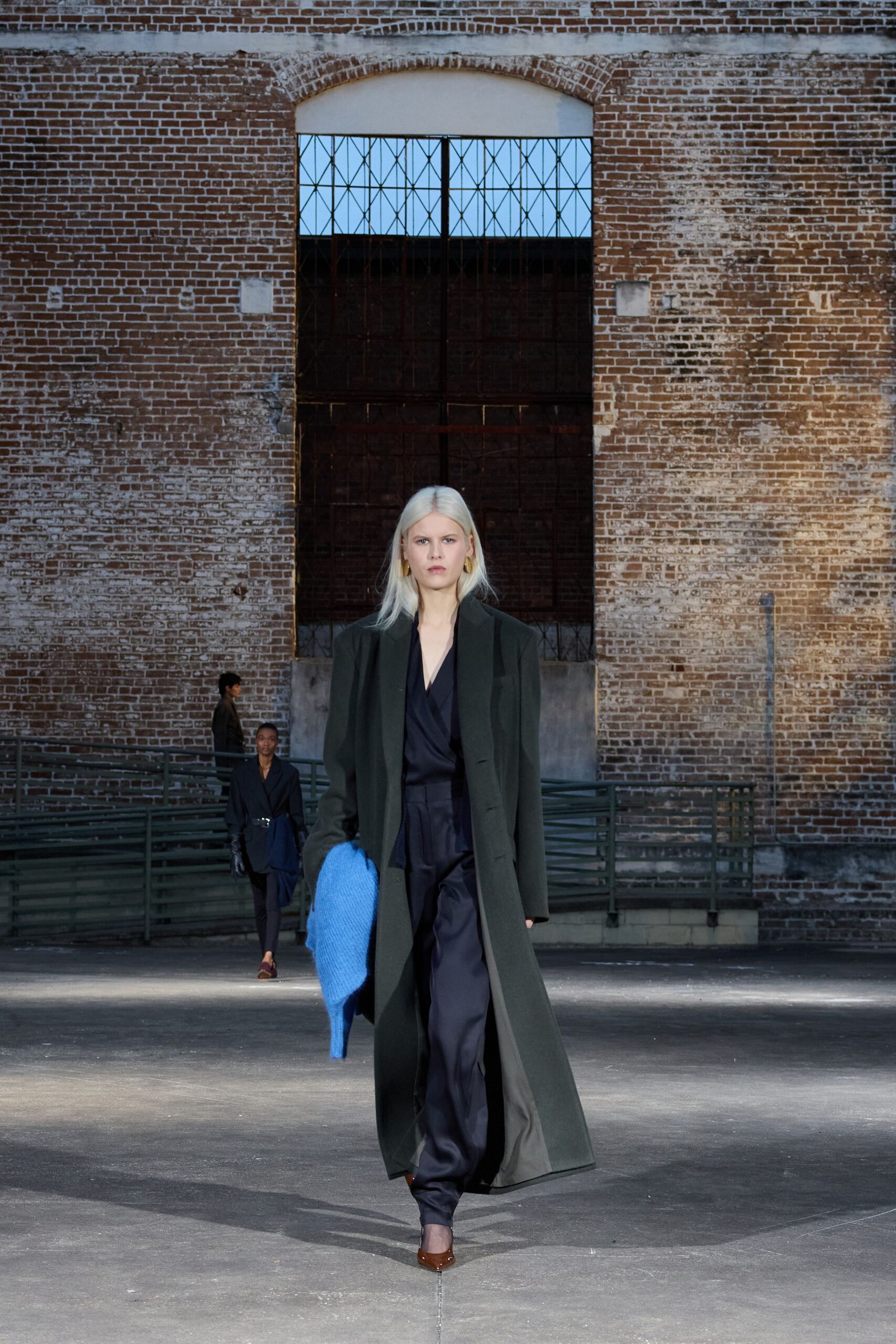 blue silk long-sleeve v-neck fitted jumpsuit