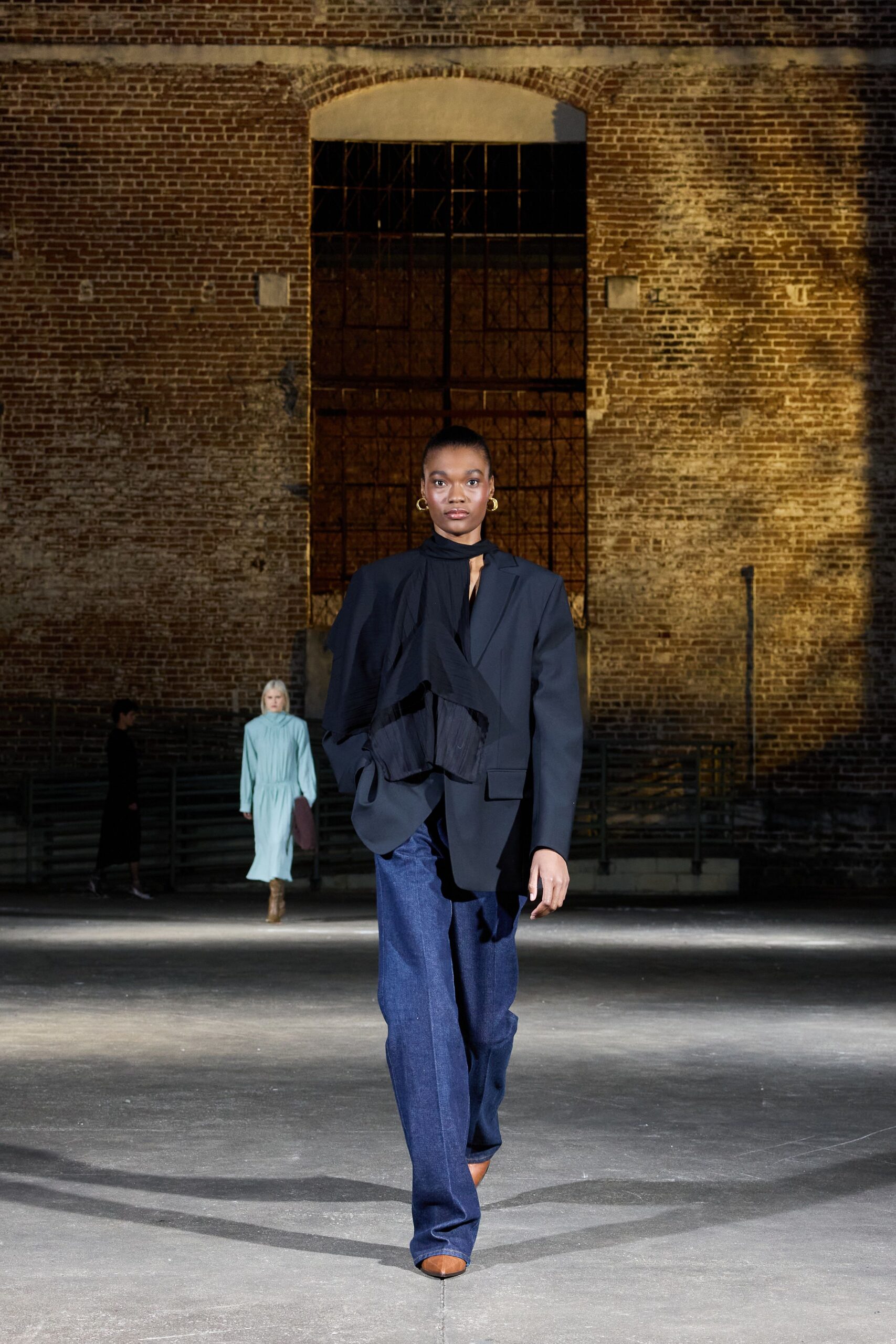 black blazer with blue pants