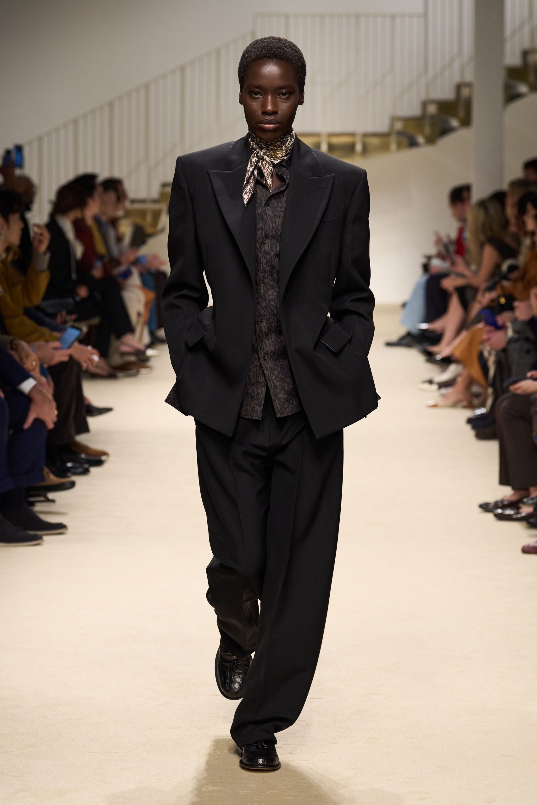 black long-sleeve collared relaxed suit