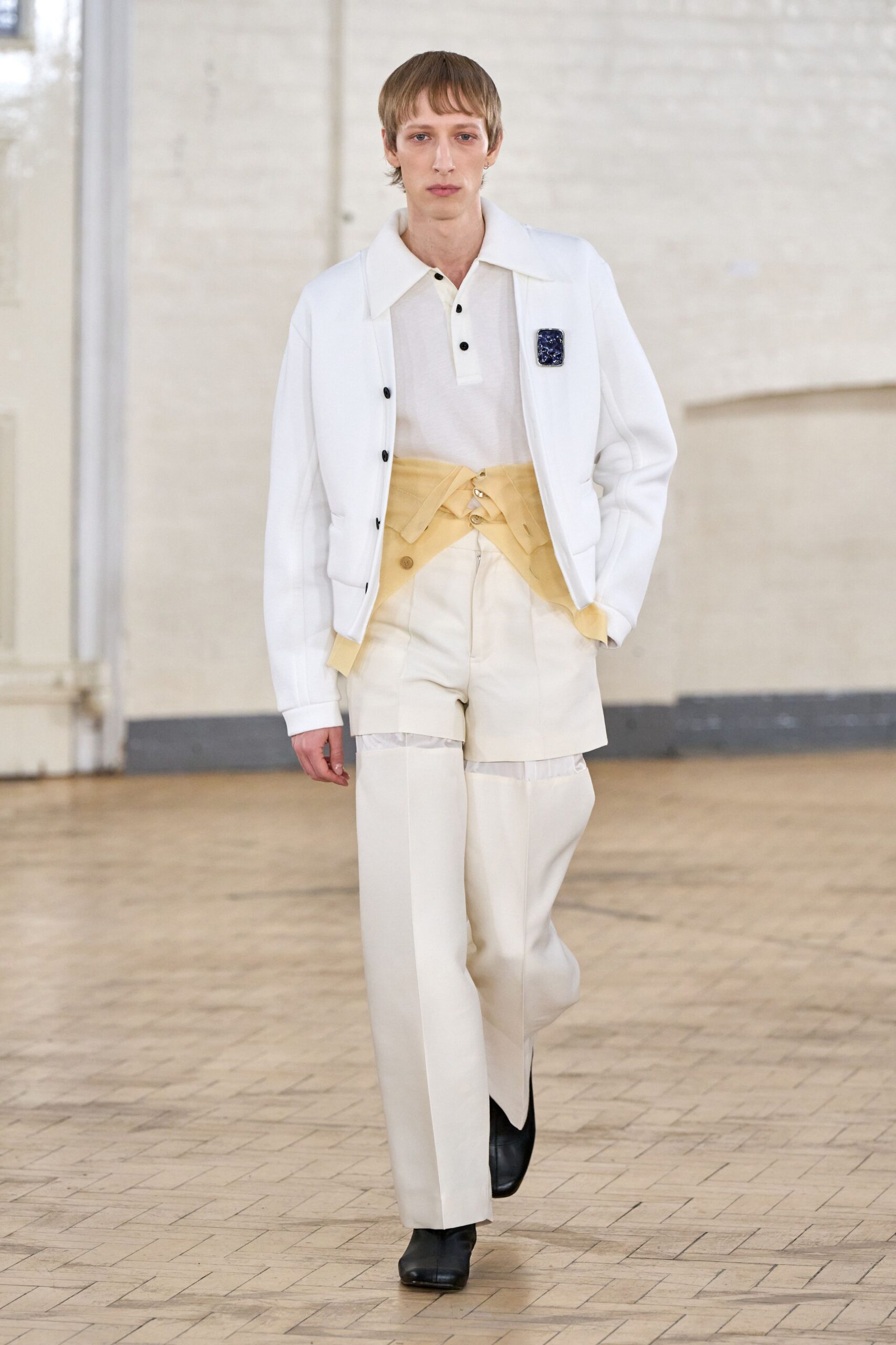 white jacket with beige pants