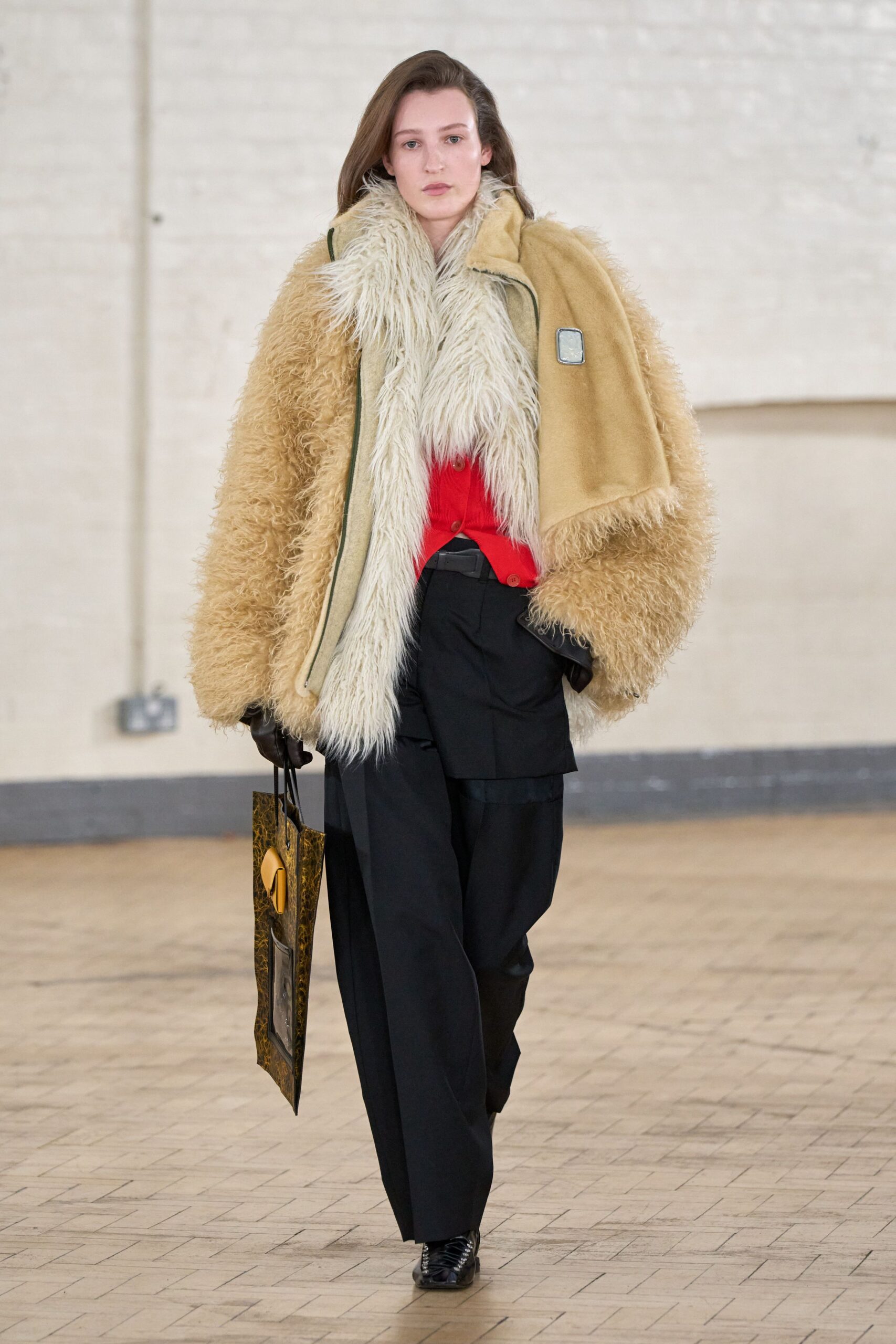 beige fur coat with red top