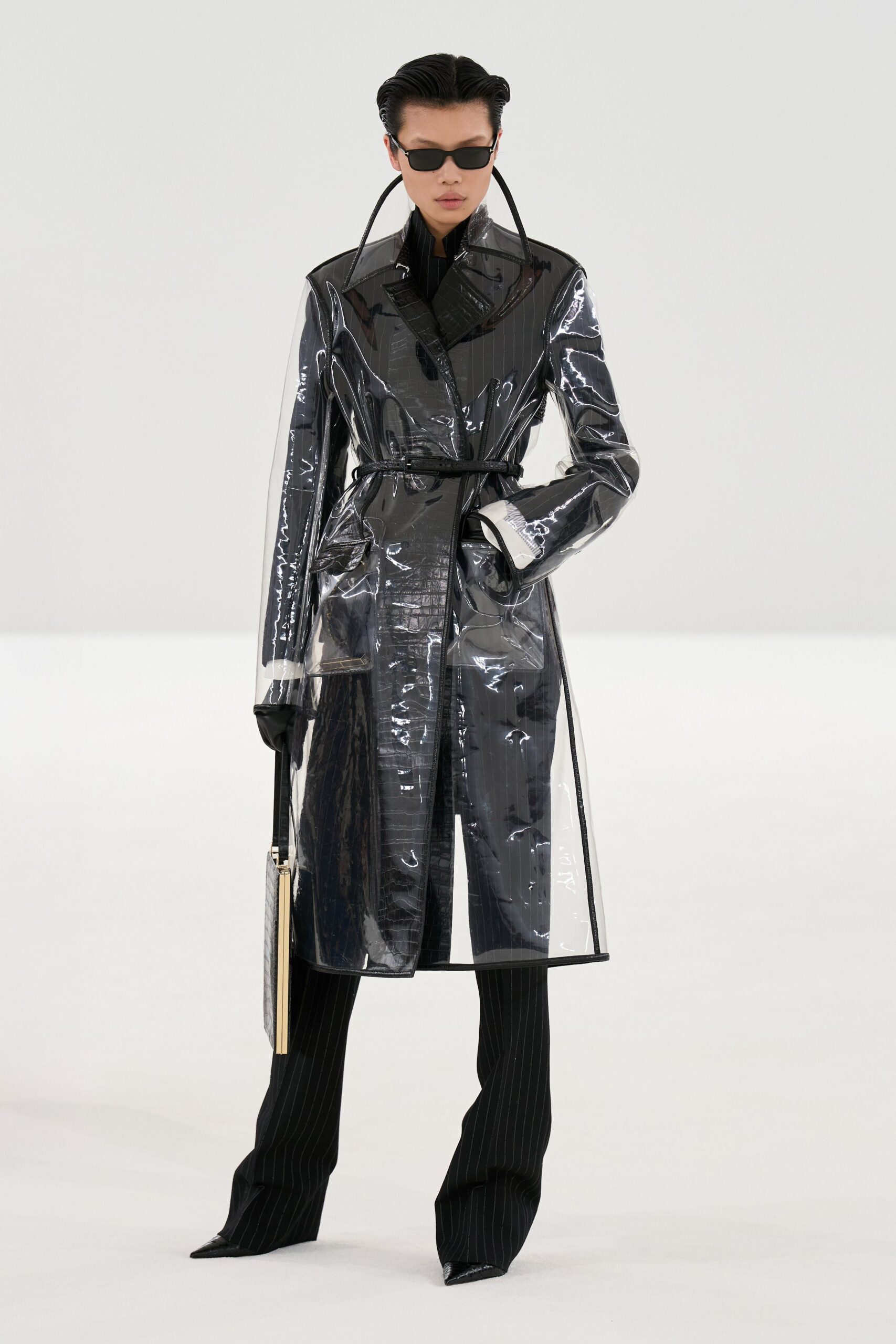 black vinyl long-sleeve collared fitted zippered belted coat