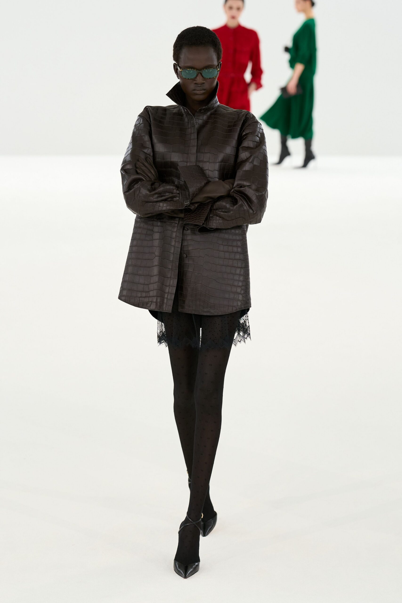 black leather long-sleeve collared fitted textured jacket