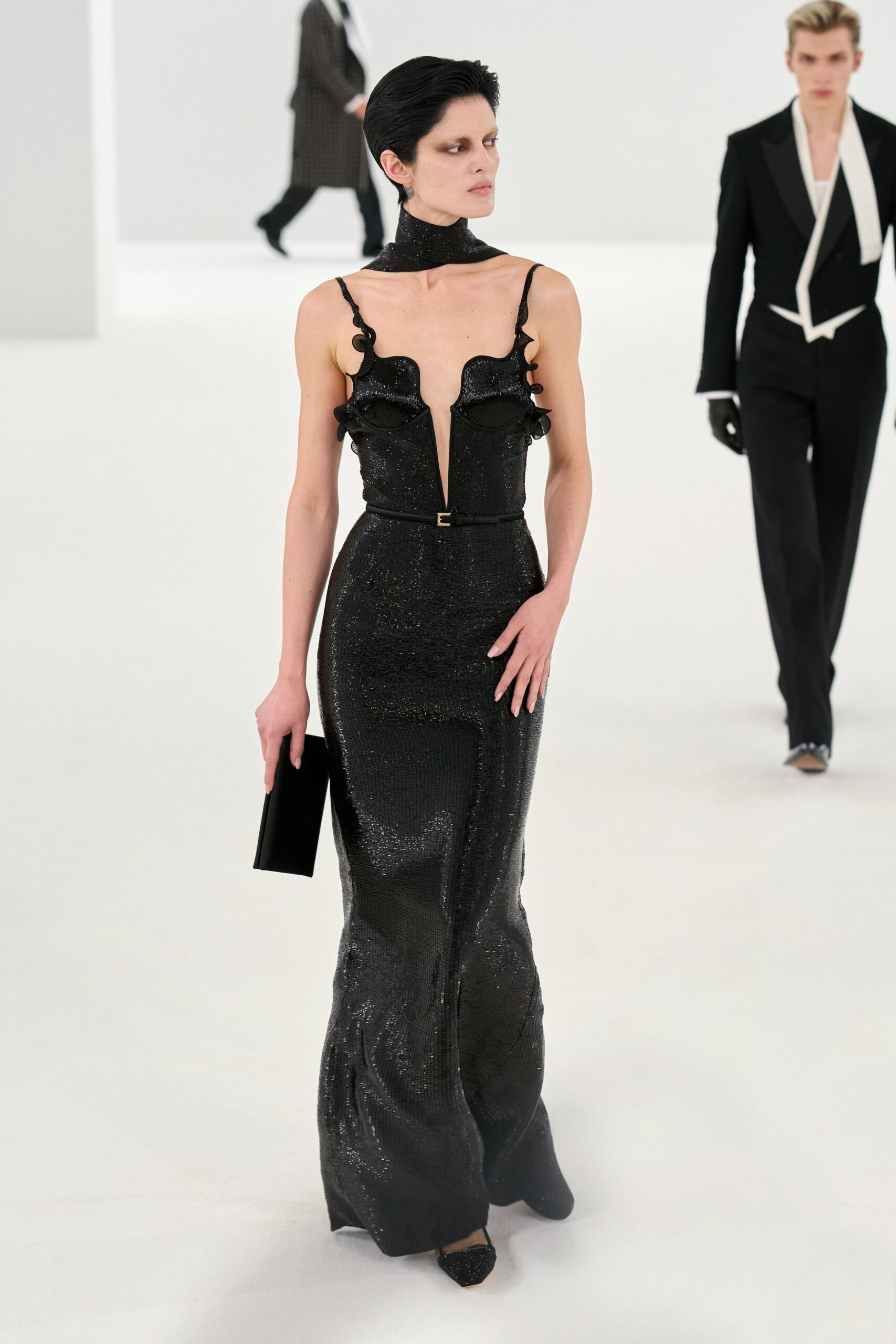 black fitted gown with clutch