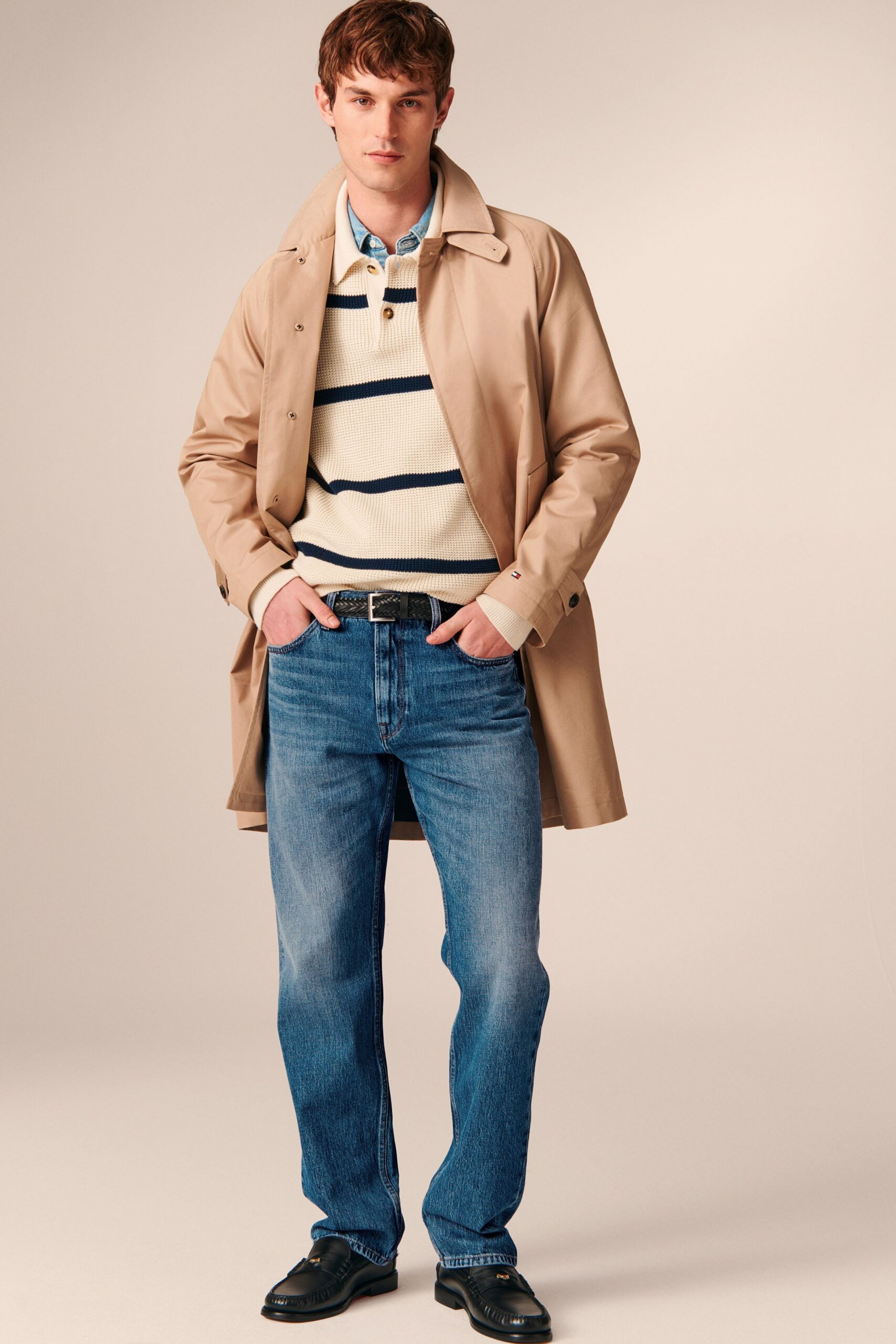 beige coat with black shoes