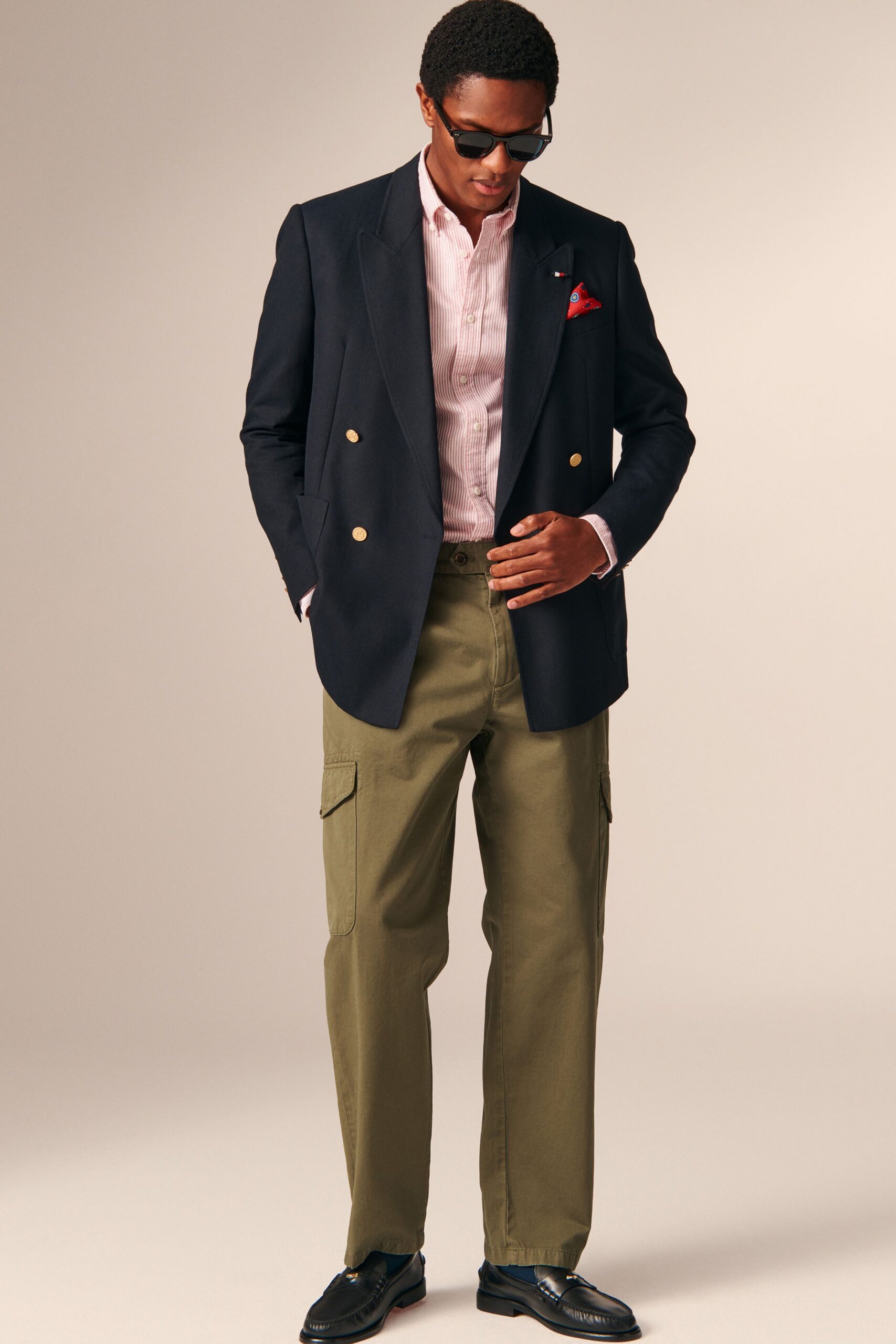 black blazer pink shirt green pants