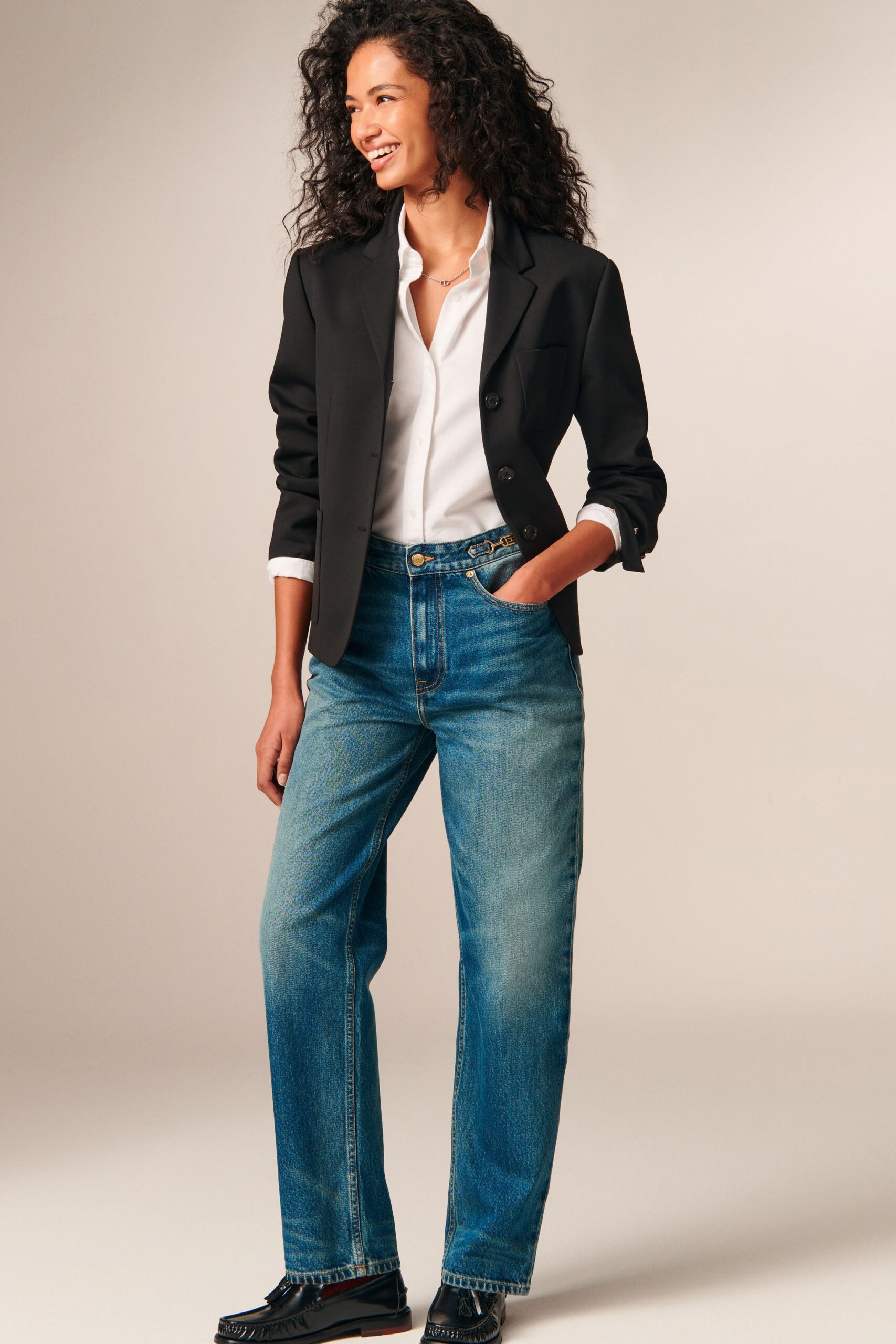 black blazer white shirt blue jeans