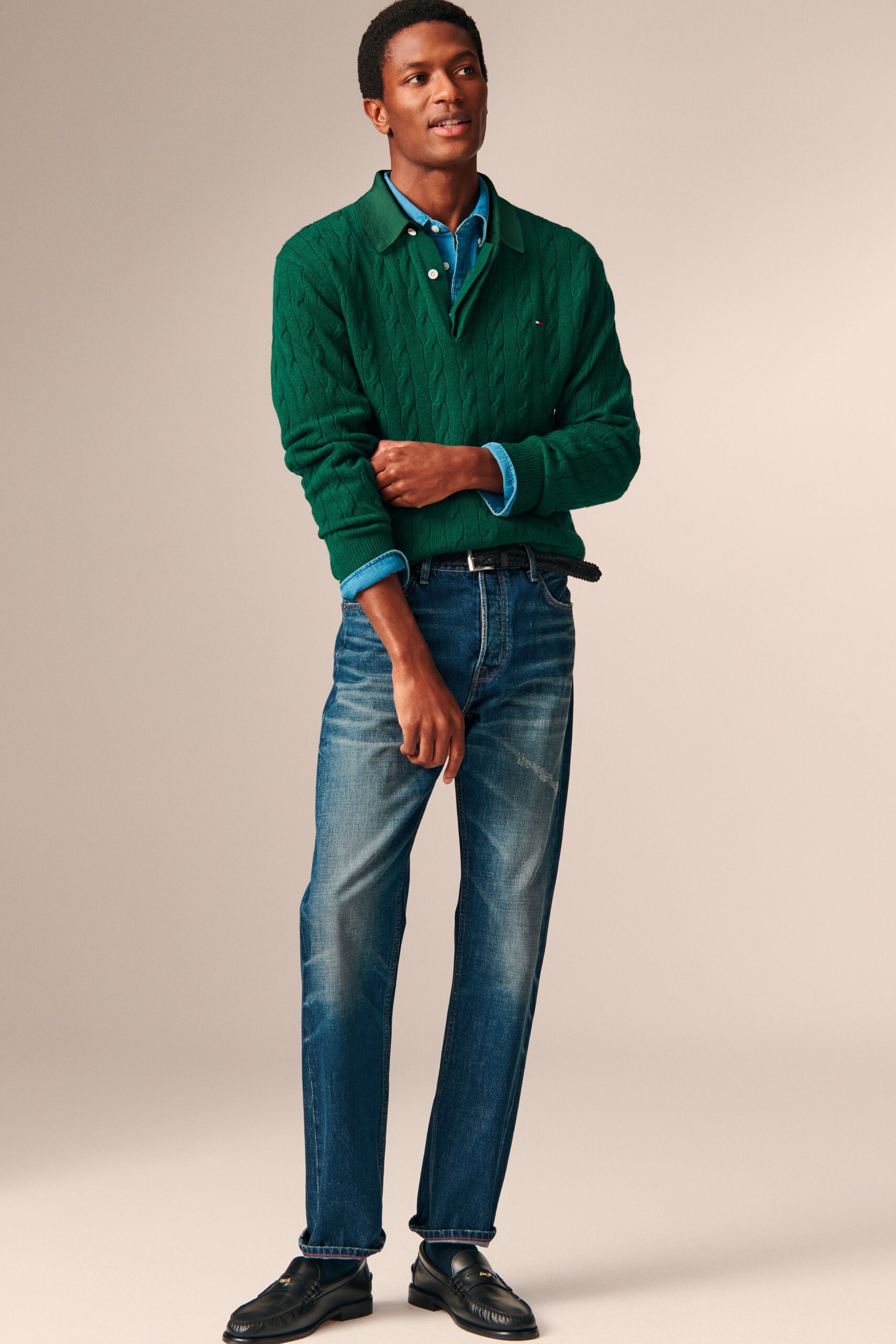 green sweater blue shirt jeans