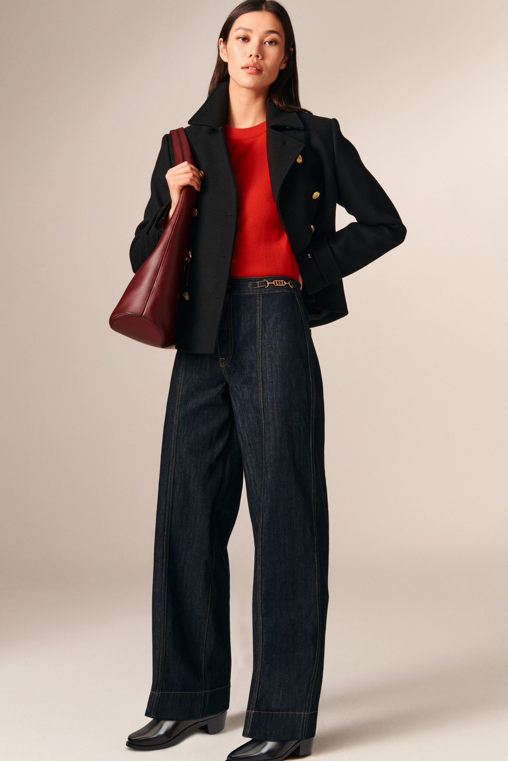 black wool long-sleeve collared structured jacket