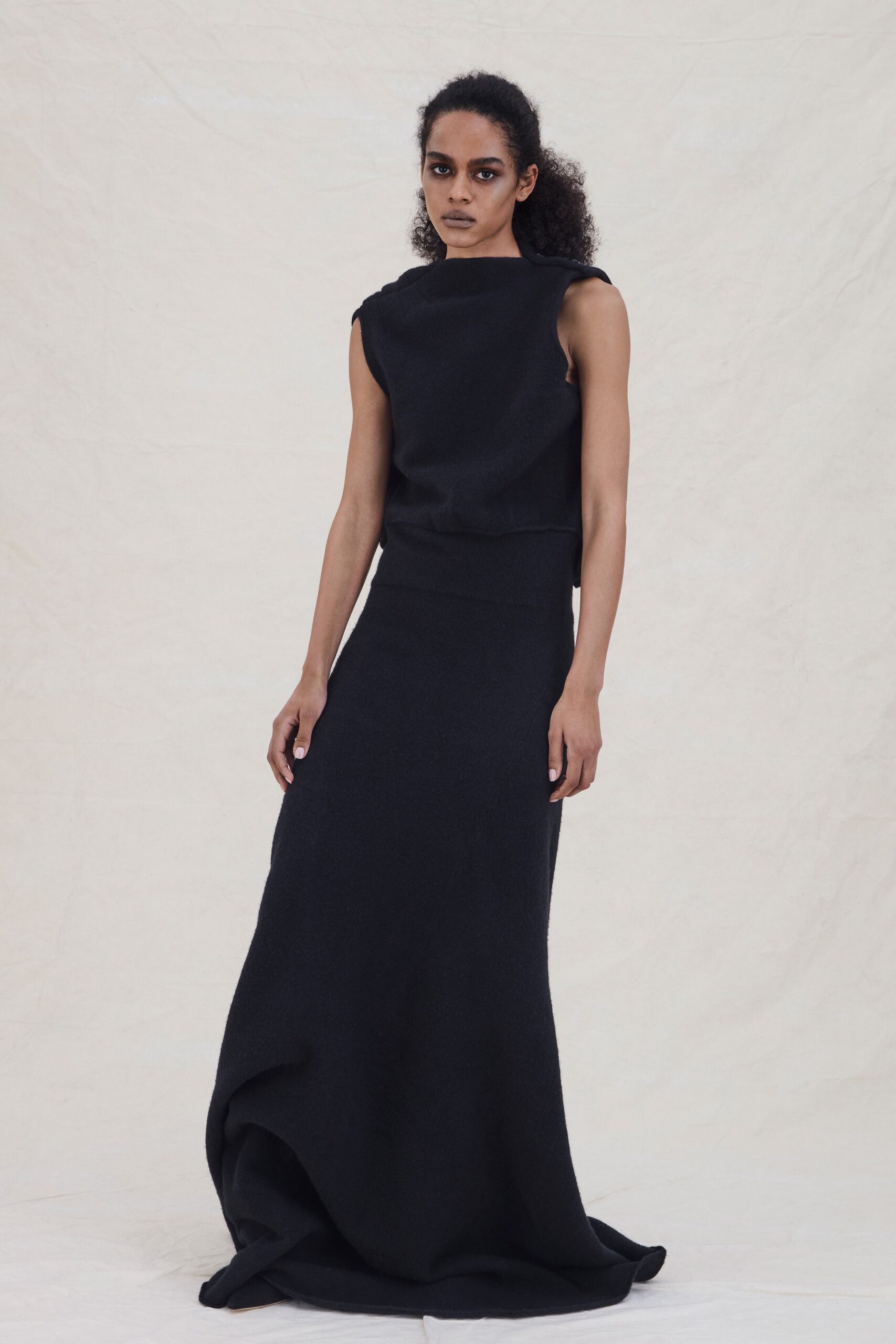 black fitted sleeveless gown
