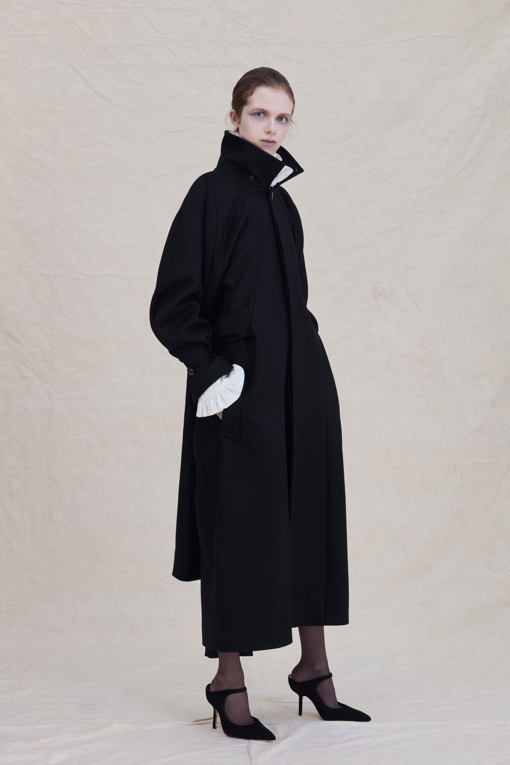black wool relaxed coat with heels