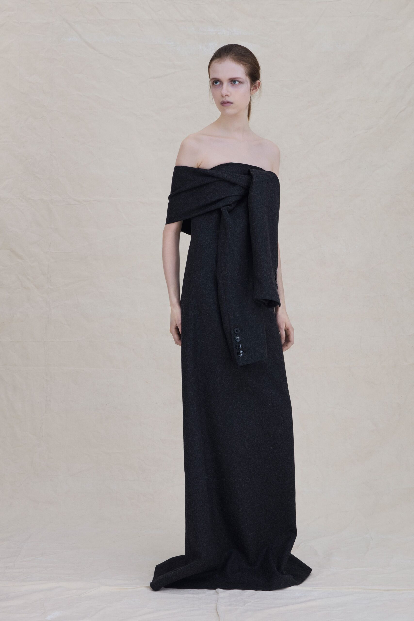 black strapless draped gown