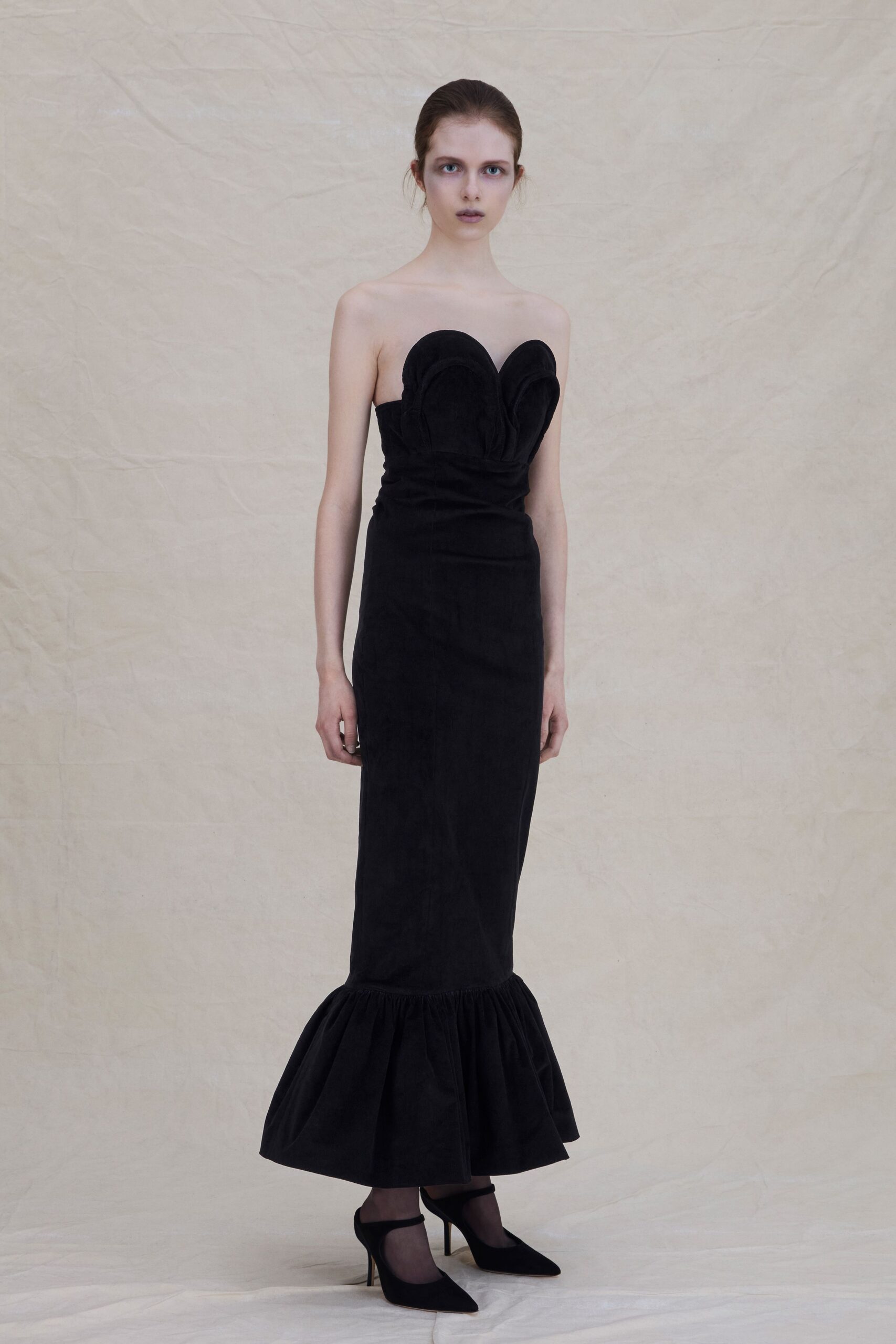 black suede strapless fitted ruffled maxi gown