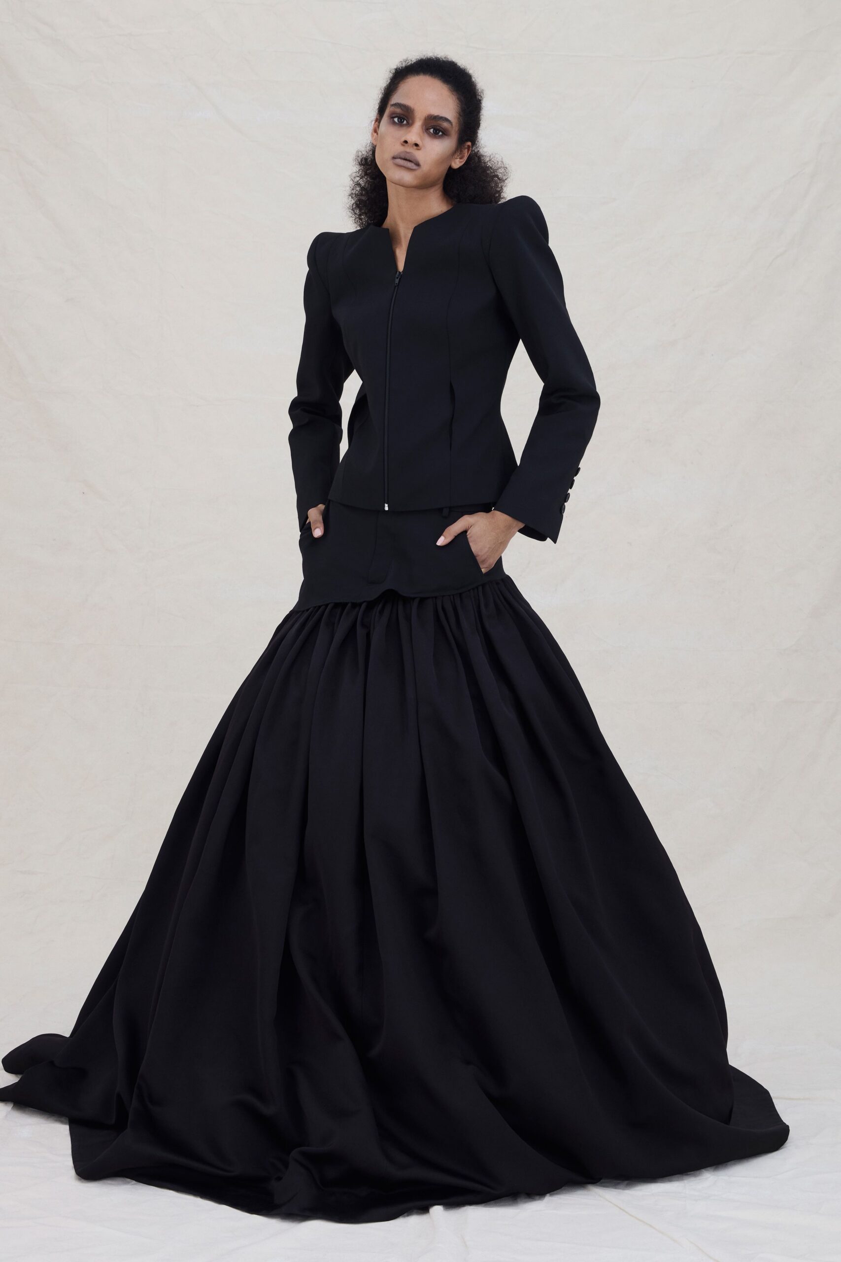 black fitted jacket and gown