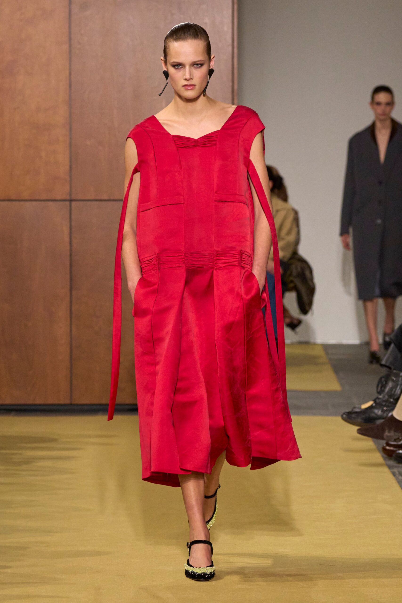 red silk sleeveless square-neck relaxed pleated midi dress