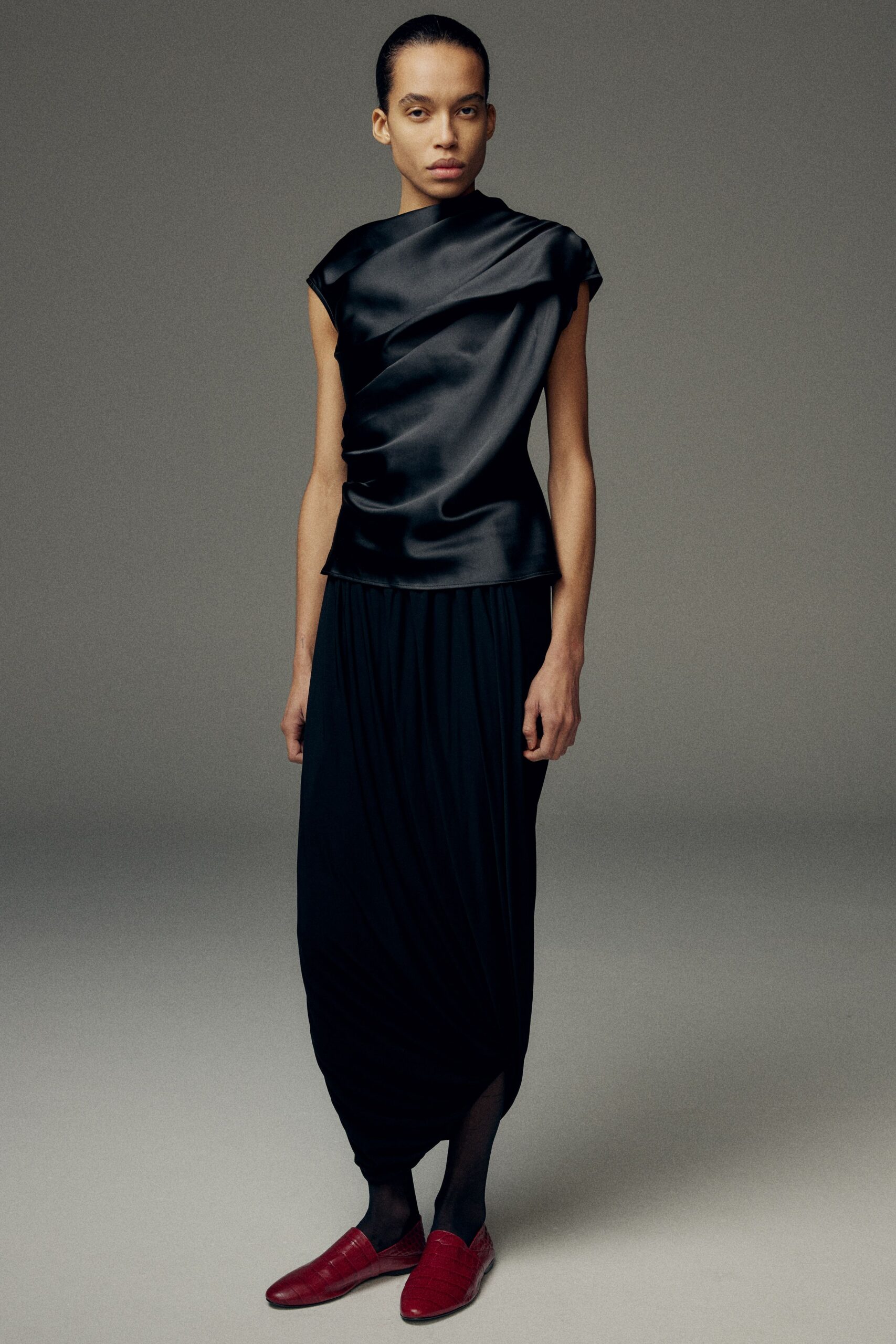 black silk sleeveless fitted draped top