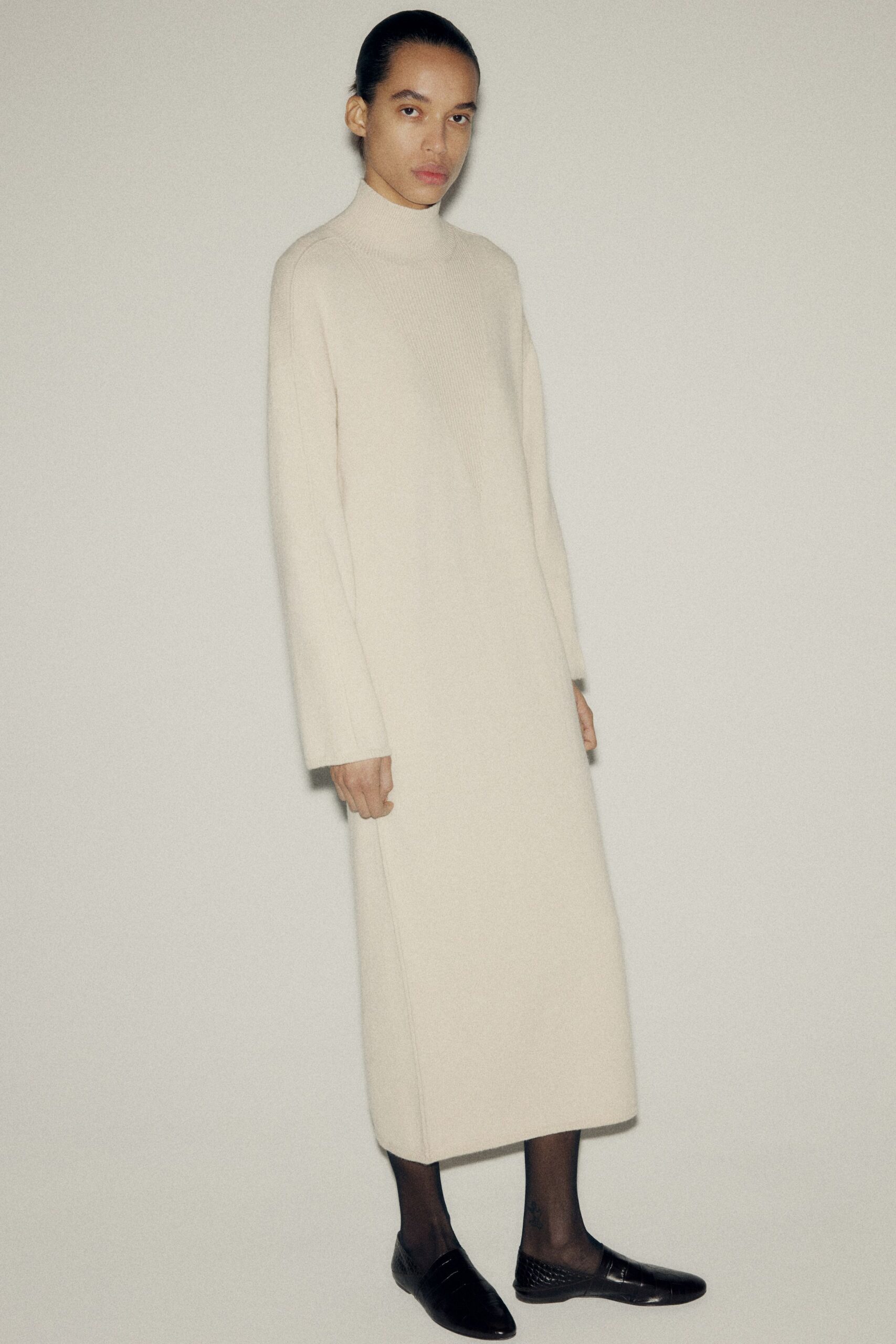 beige wool long-sleeve turtleneck relaxed midi dress