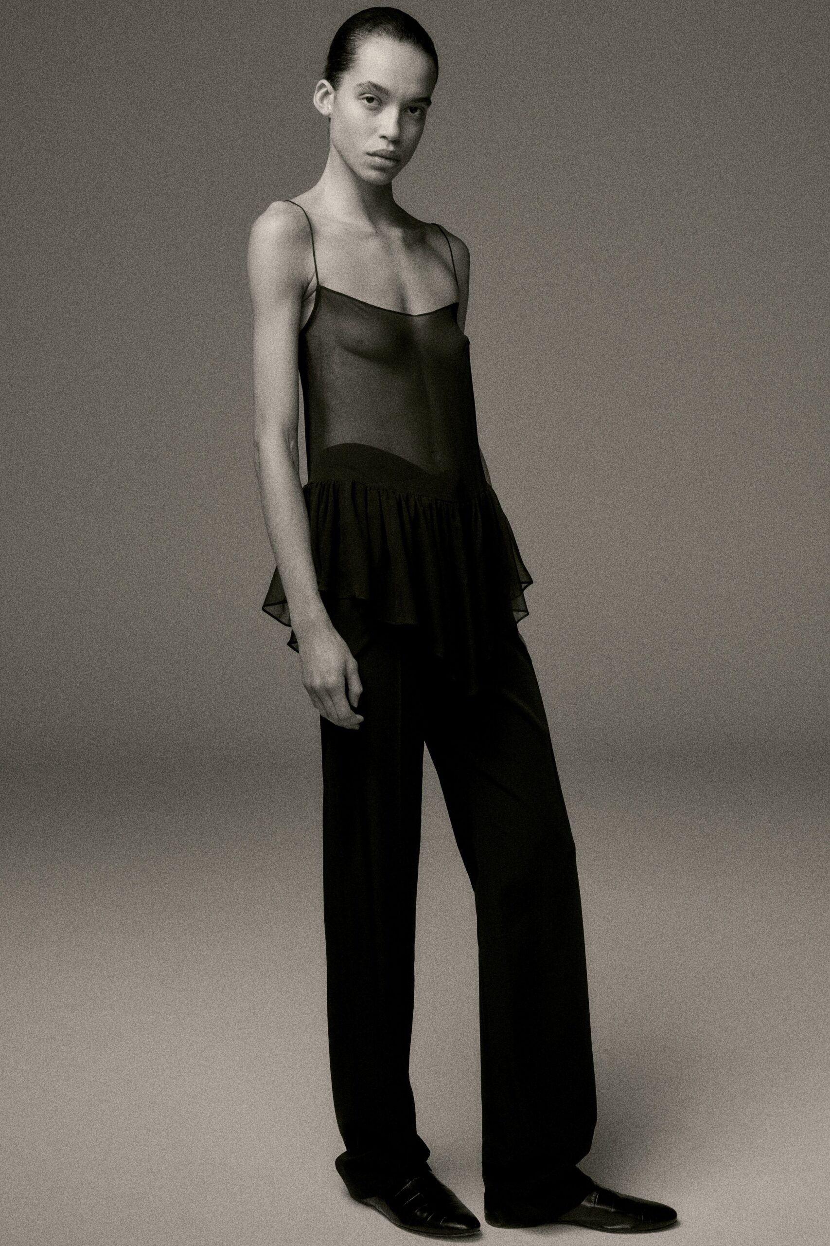 black silk sleeveless v-neck fitted layered sheer top