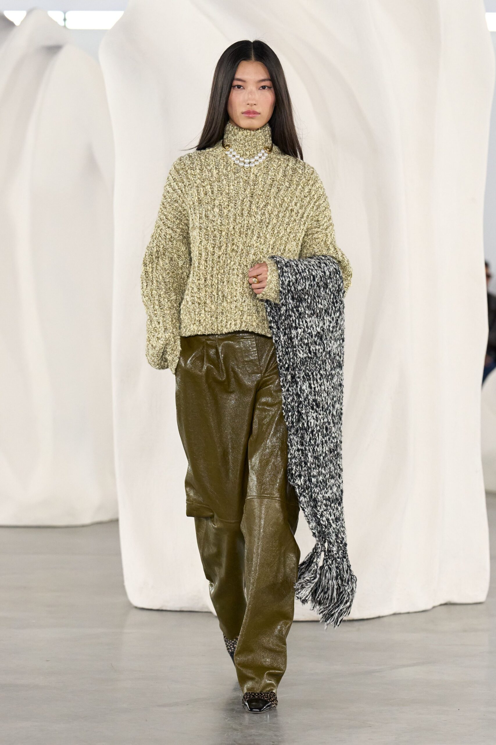 green wool long-sleeve turtleneck relaxed ribbed sweater