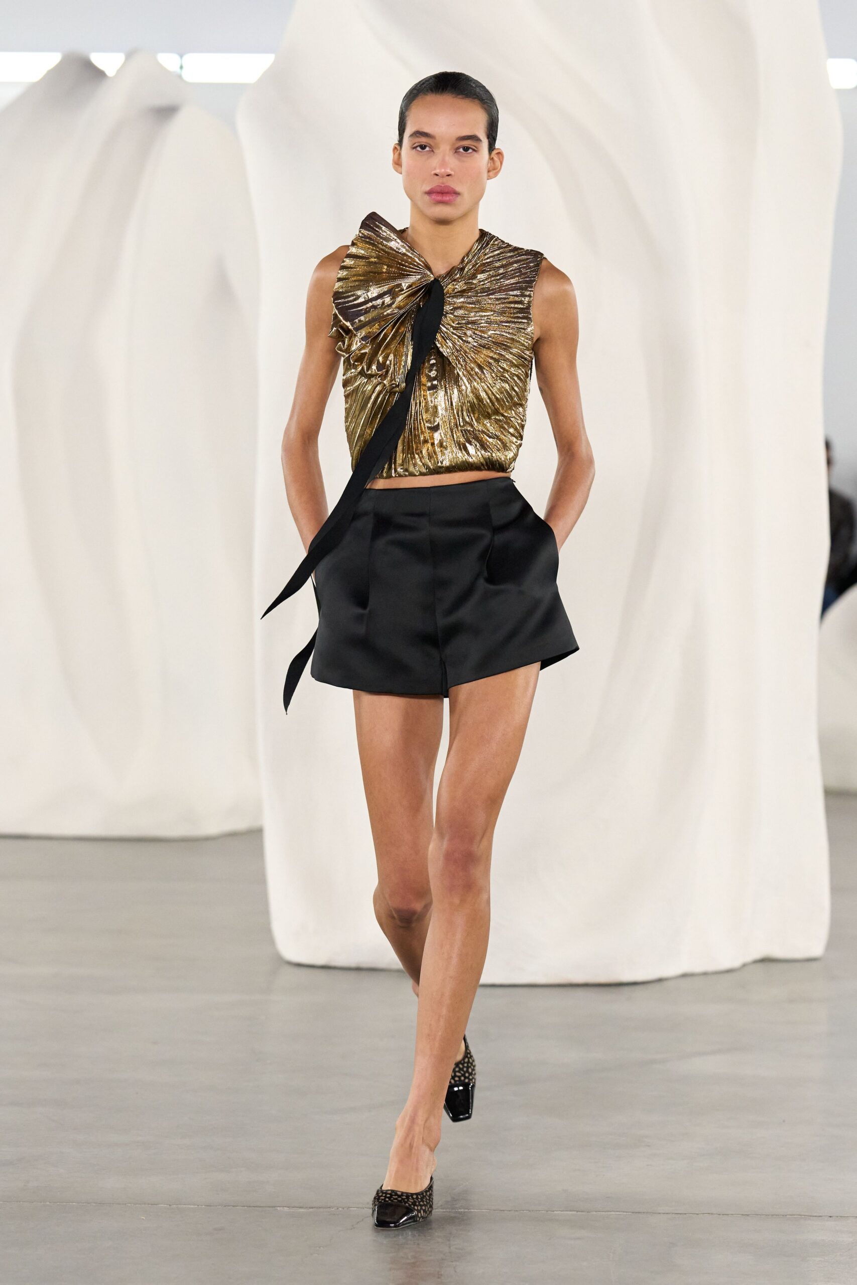 gold silk sleeveless high-neck fitted pleated draped top