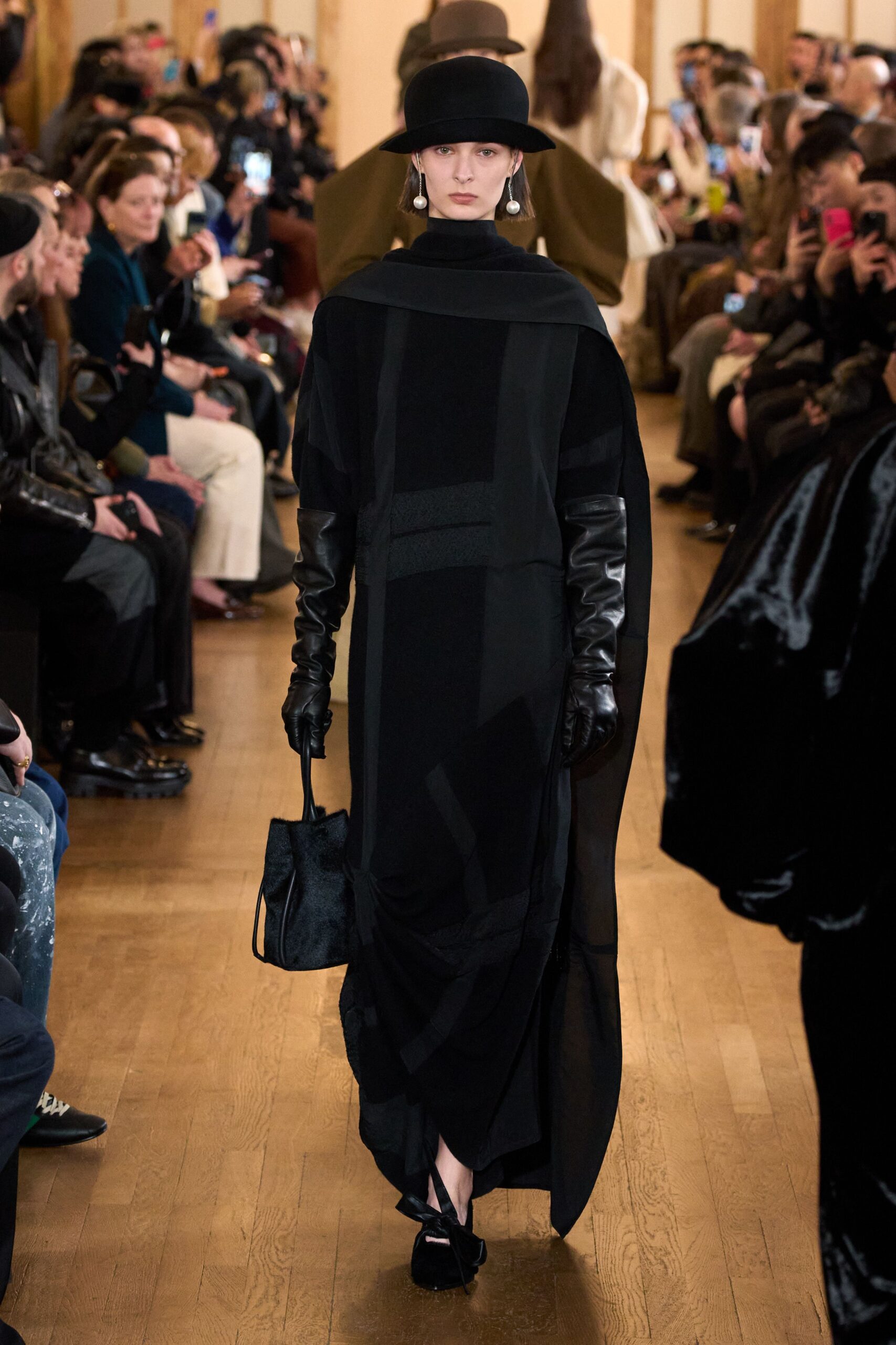 black draped maxi dress with accessories