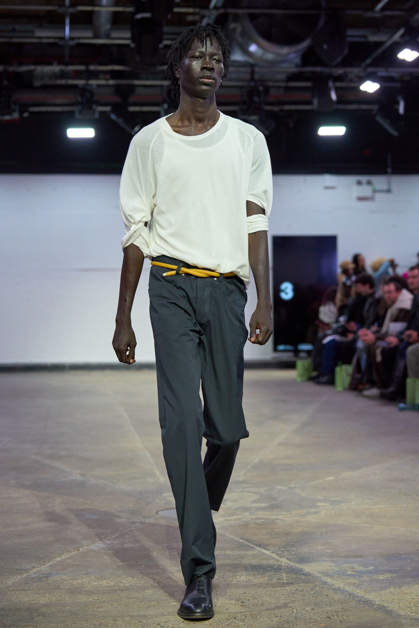 white relaxed top with black pants