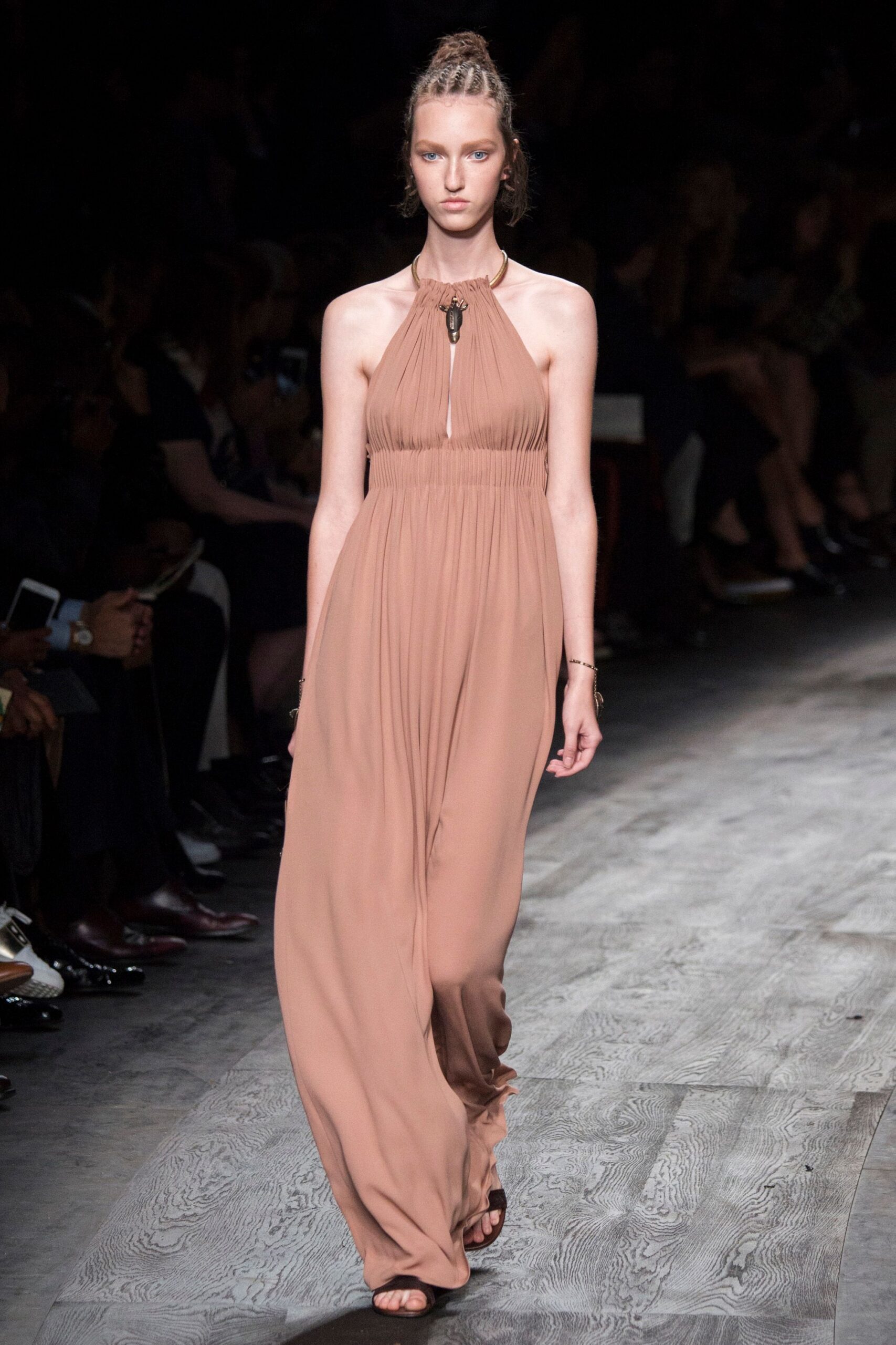 beige silk sleeveless high-neck fitted draped flowing gown