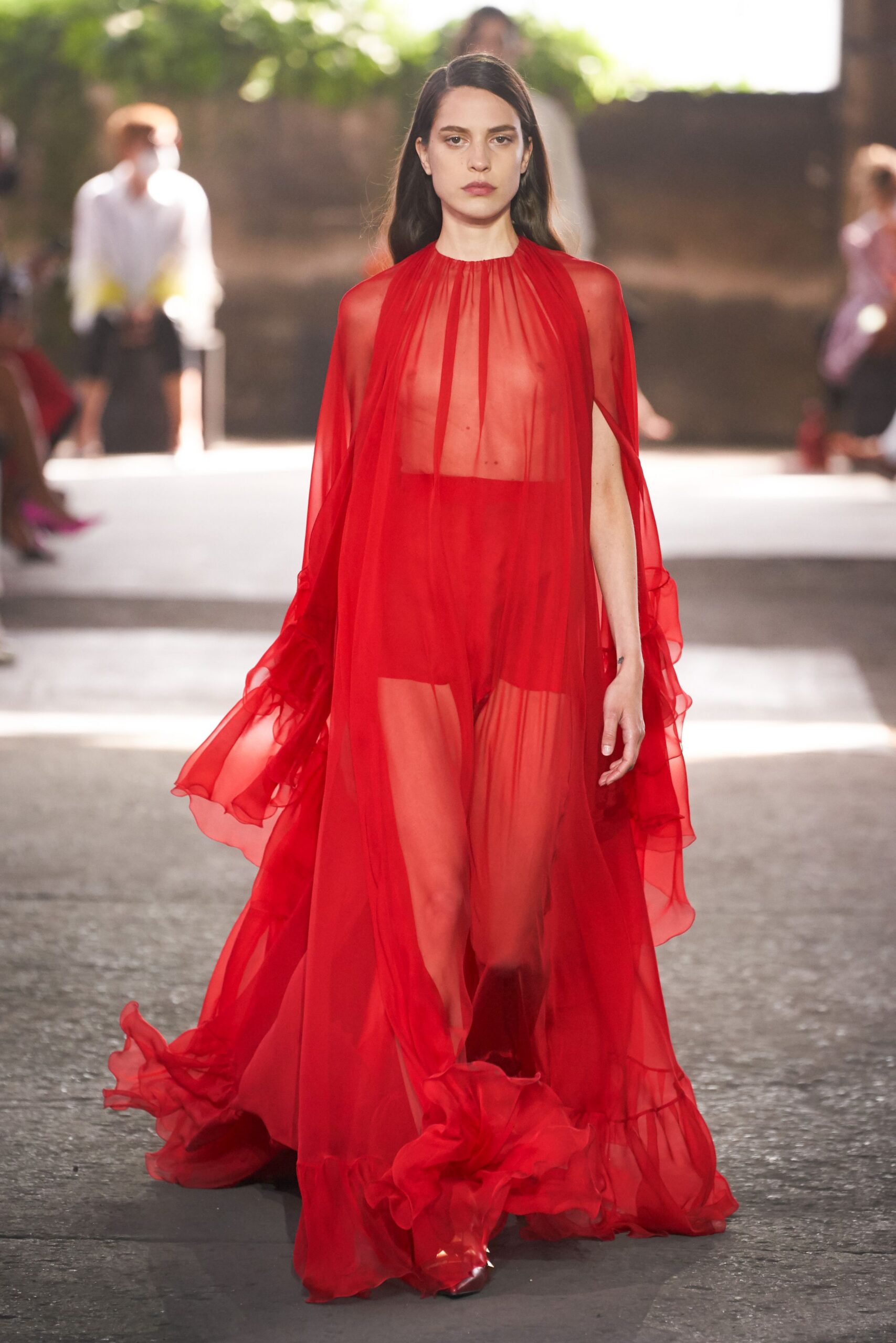red sheer flowing gown