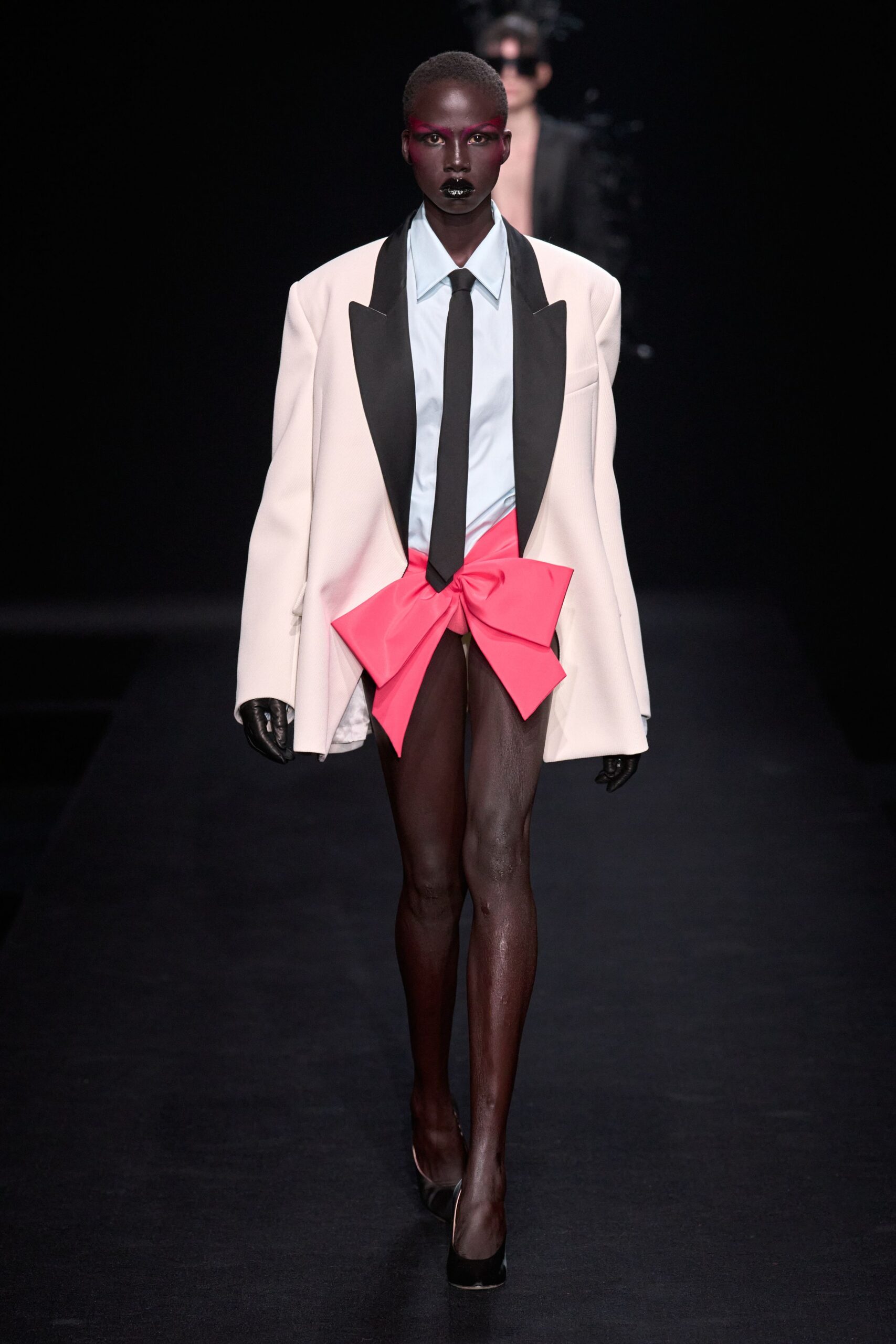 pink blazer with black skirt