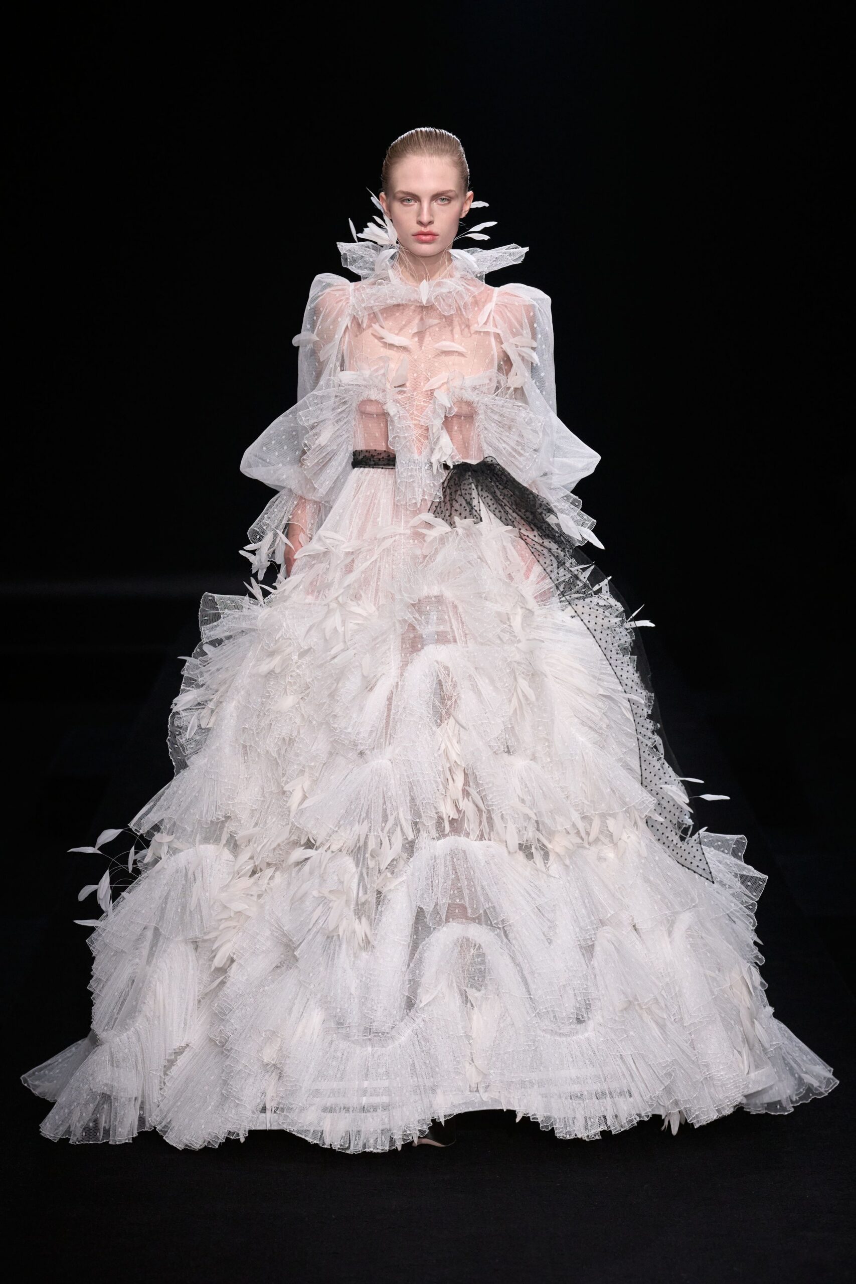 white ruffled tulle gown
