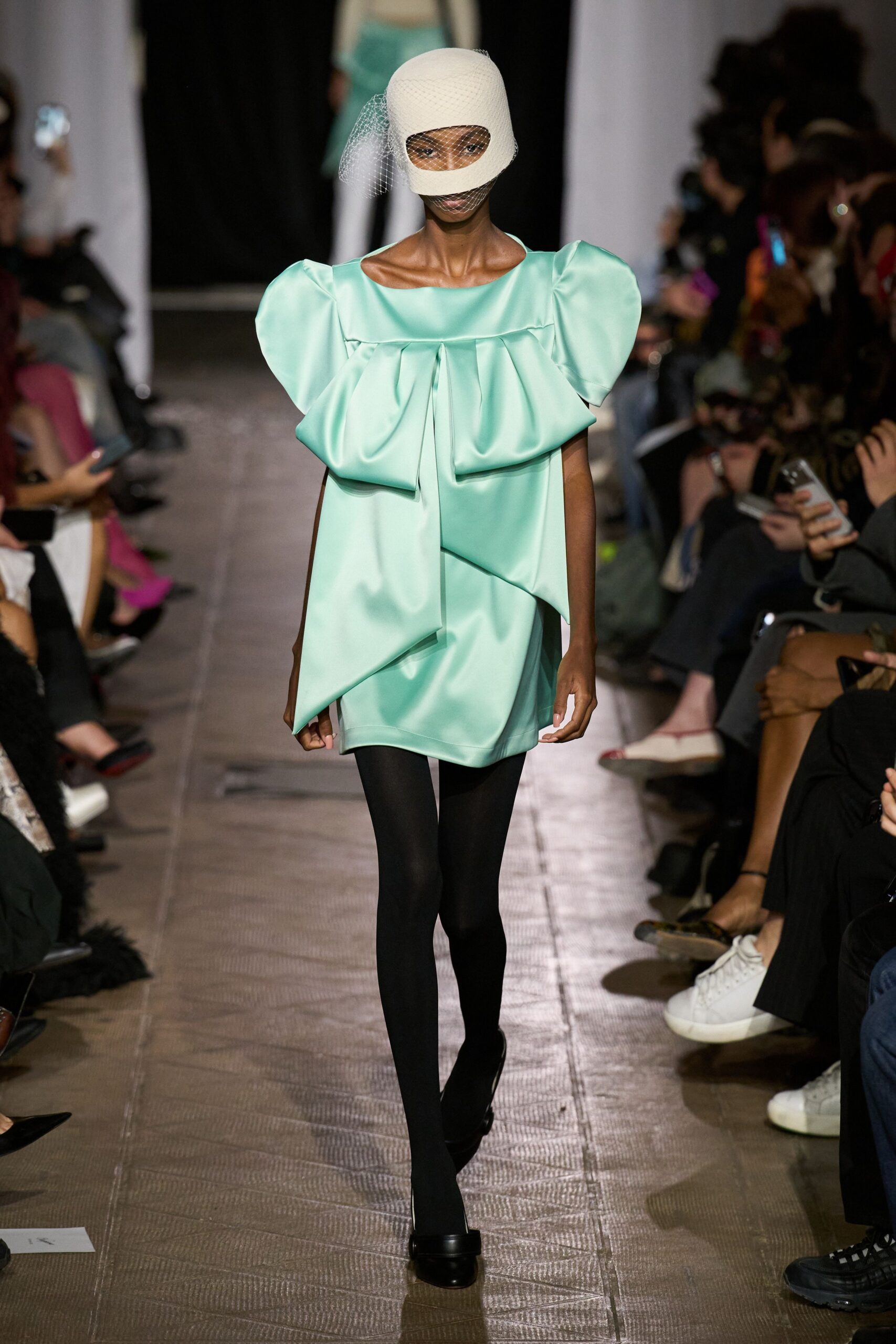 green satin sleeveless high-neck relaxed draped shiny dress