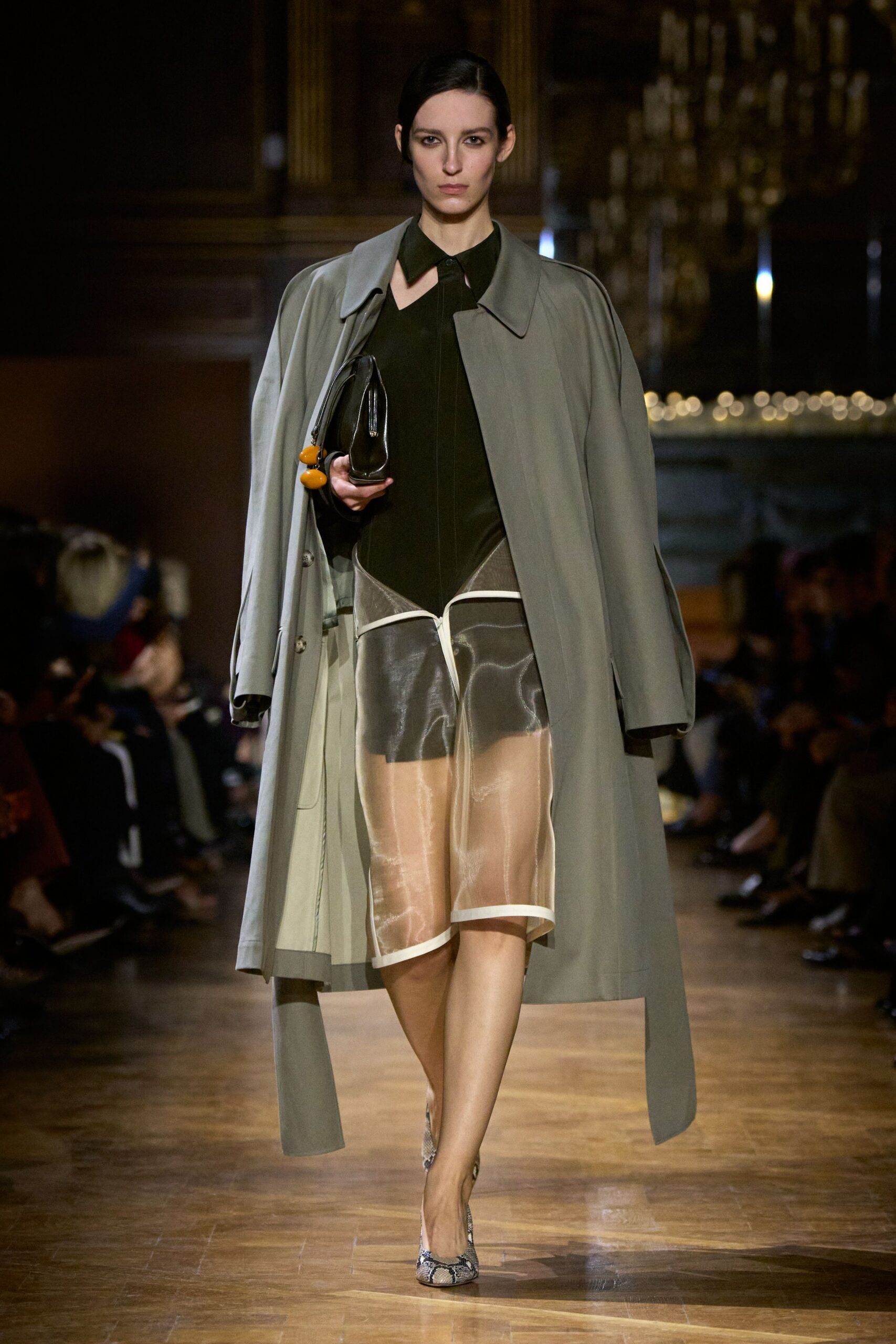 gray coat black dress silver shoes