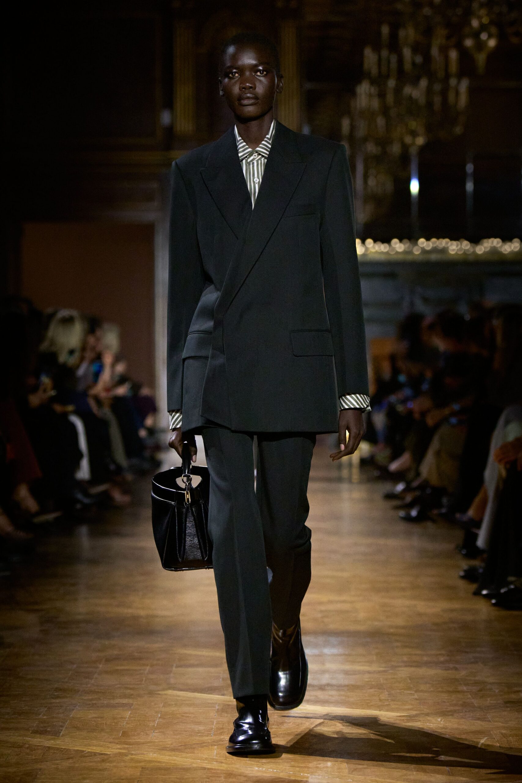black tailored suit with striped shirt