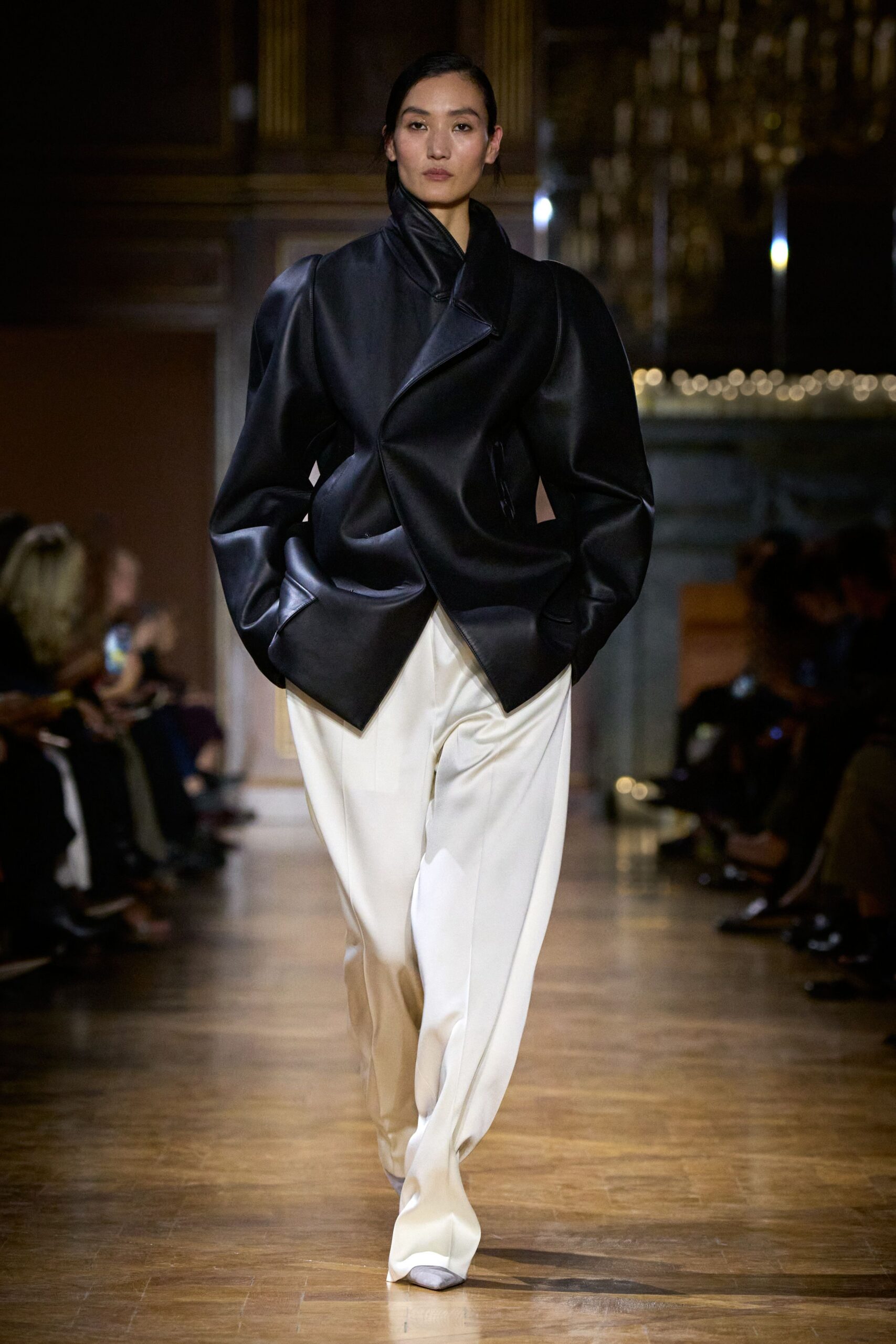 black leather long-sleeve collared structured buttoned jacket