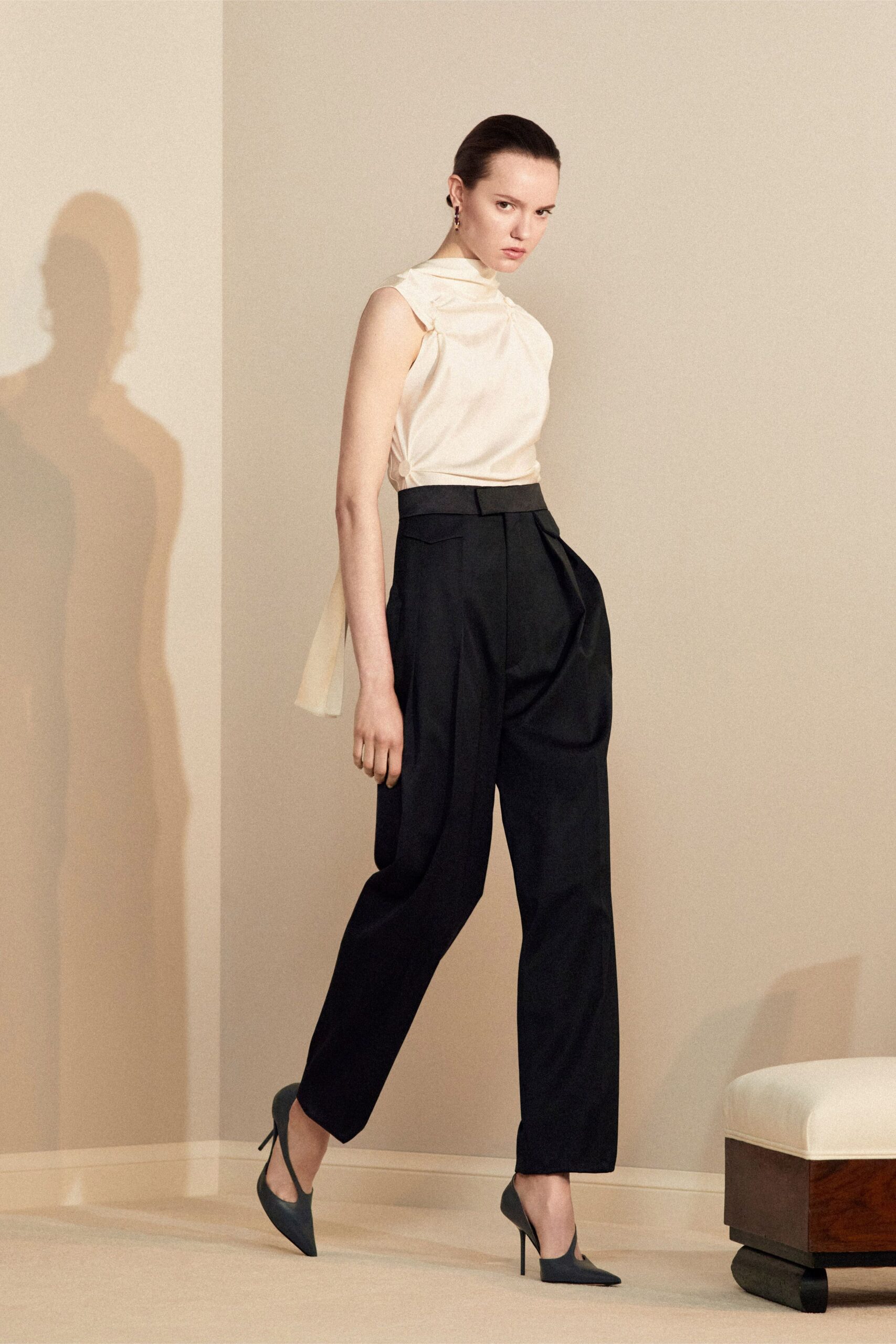 ivory silk sleeveless high-neck fitted draped top