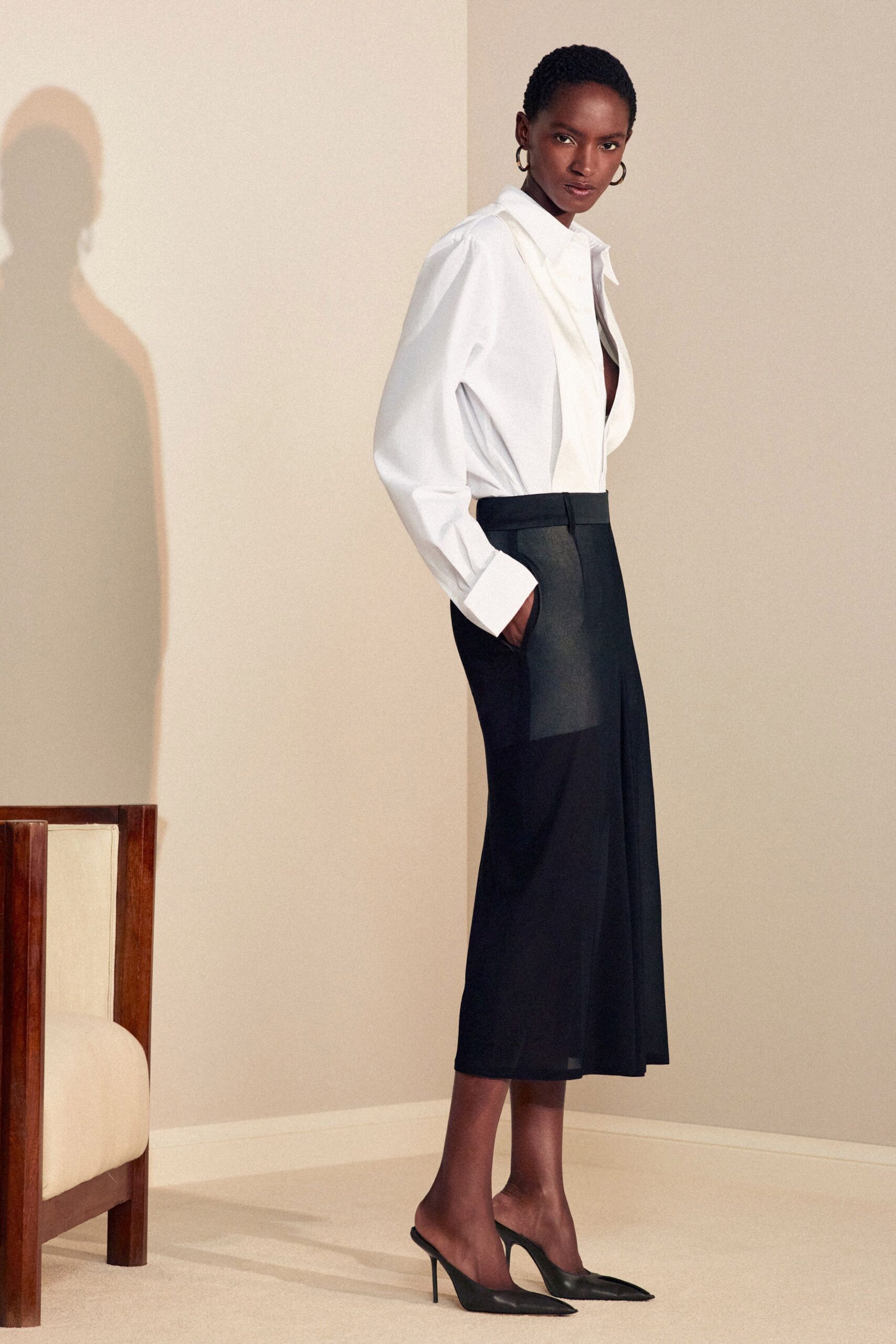 black leather fitted pencil midi skirt