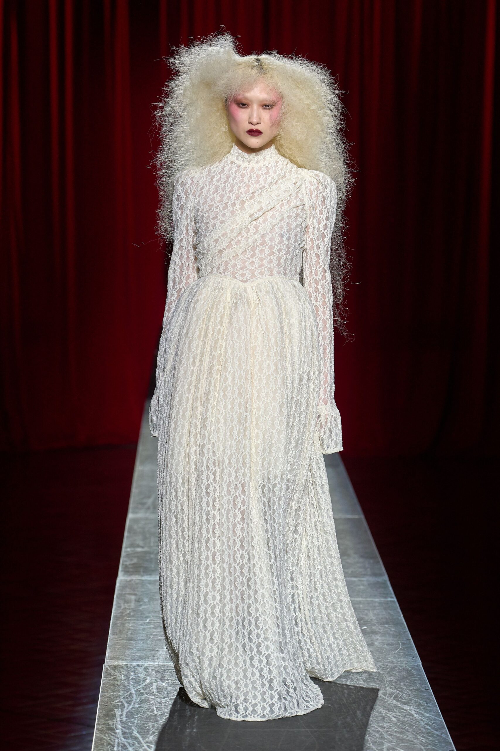 white lace long-sleeve gown