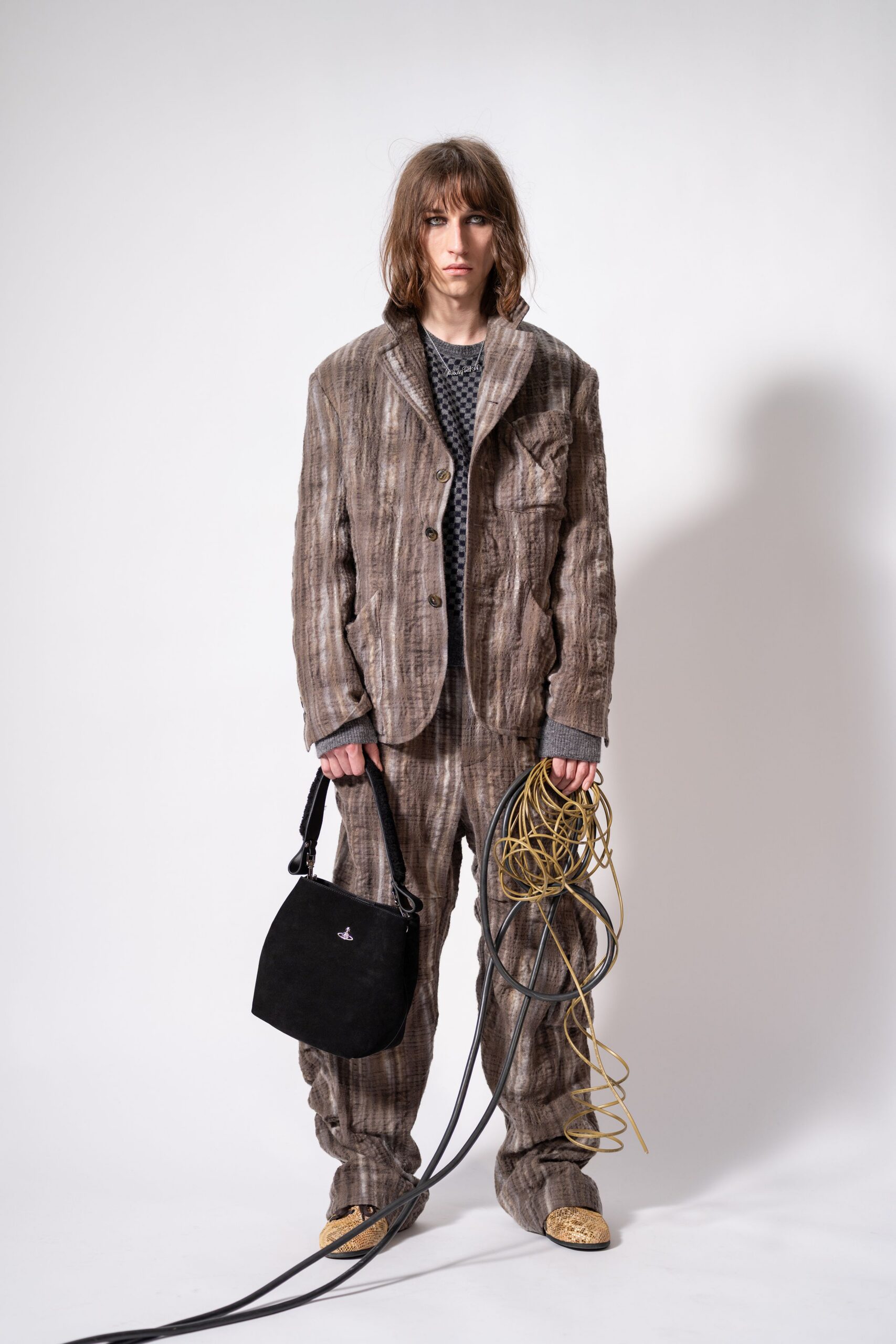 brown striped suit with bag