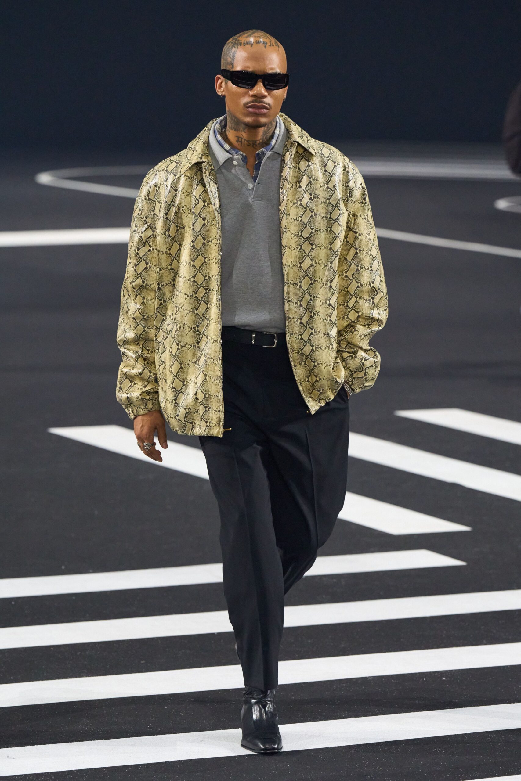 gold printed jacket with gray shirt