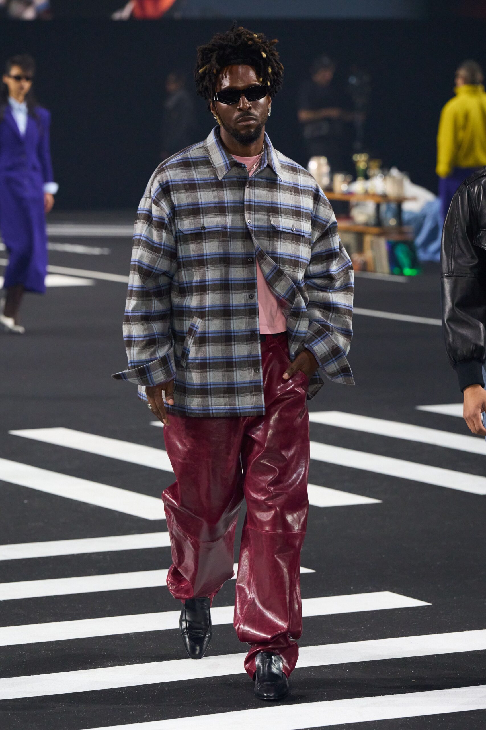 relaxed gray checked shirt with red leather pants