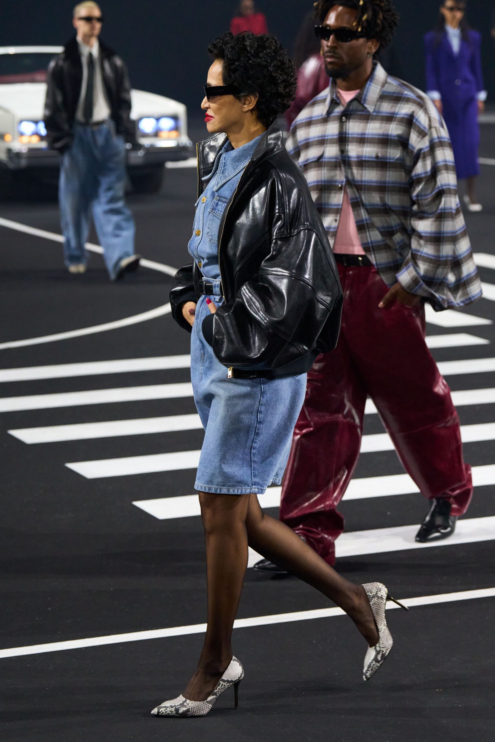 blue denim mini dress with black leather jacket