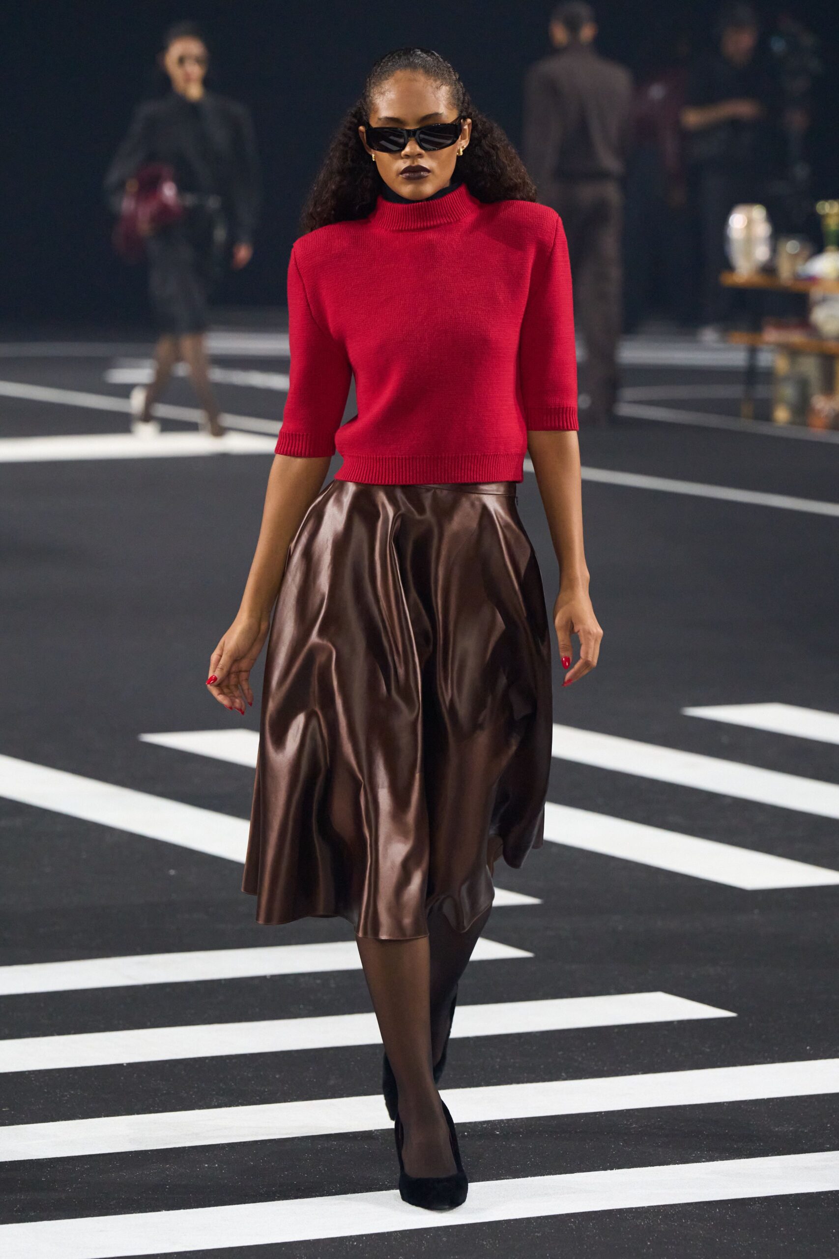 red fitted top brown pleated skirt