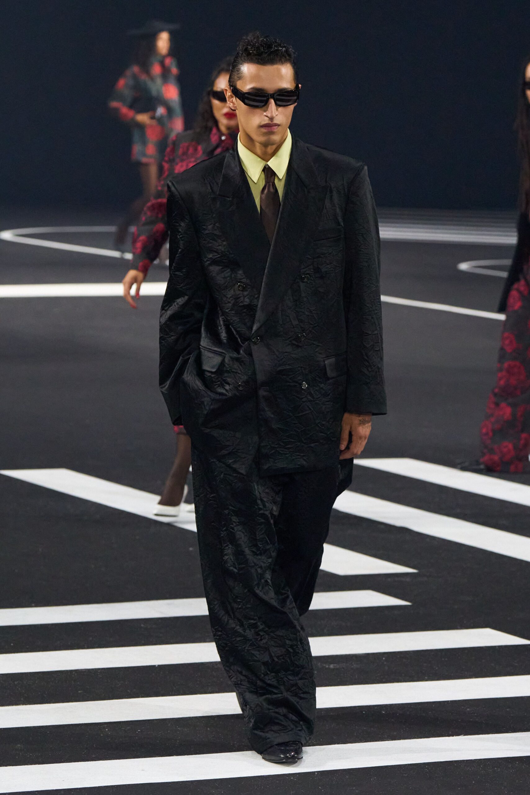 black tailored suit with yellow shirt